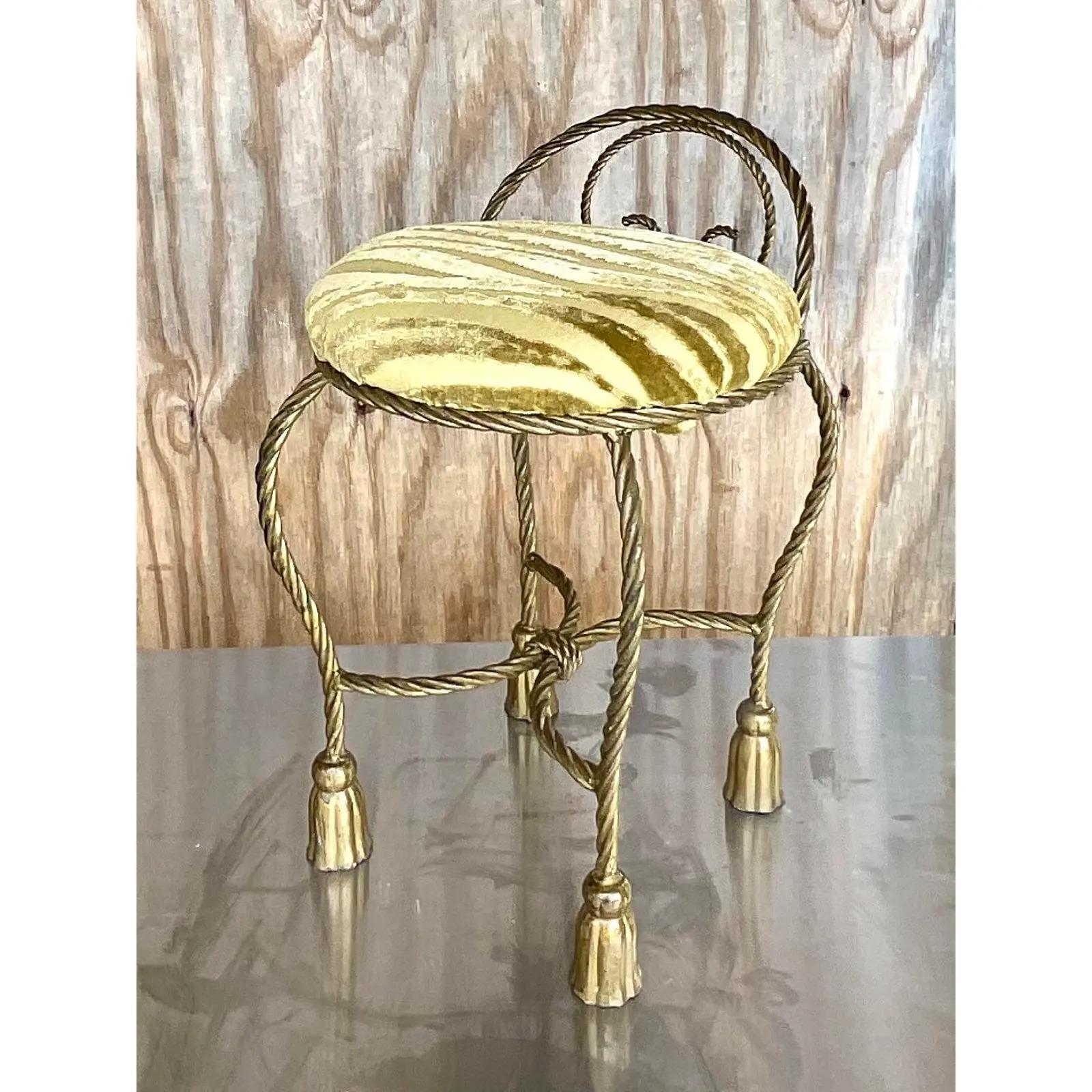 Fabulous vintage low vanity stool. The iconic rope and tassel design with a tiger Devore seat. A charming addition to any space. Acquired from a Palm Beach estate.