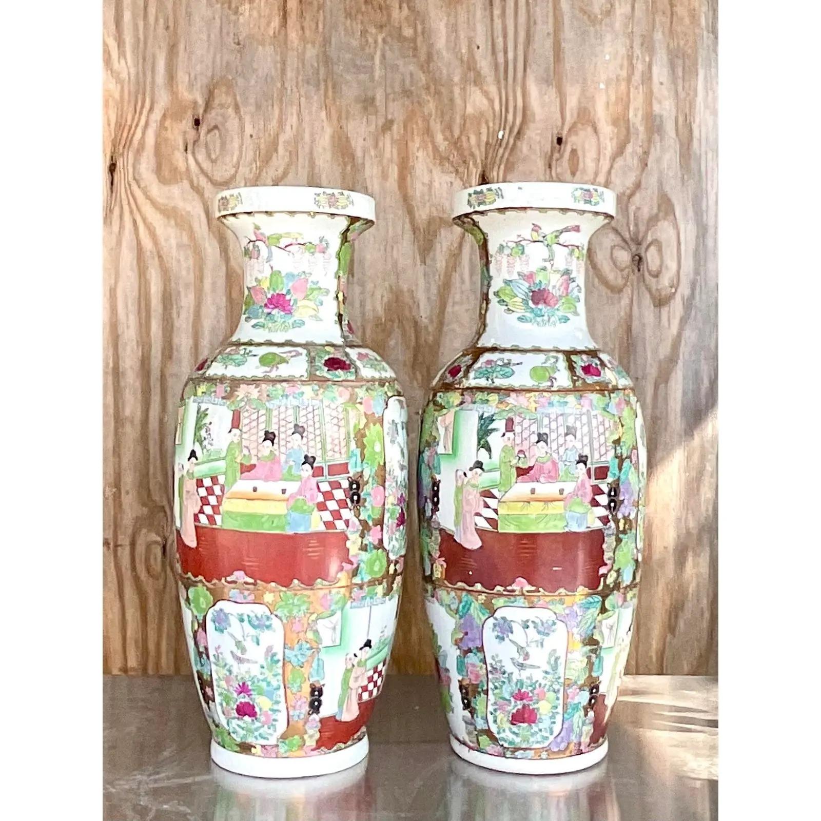 Fantastic pair of vintage Asian vases. The iconic Rose Medallion design in bright clear colors. Perfect as is, but would also make an amazing large pair of lamps. Acquired from a Palm Beach estate.