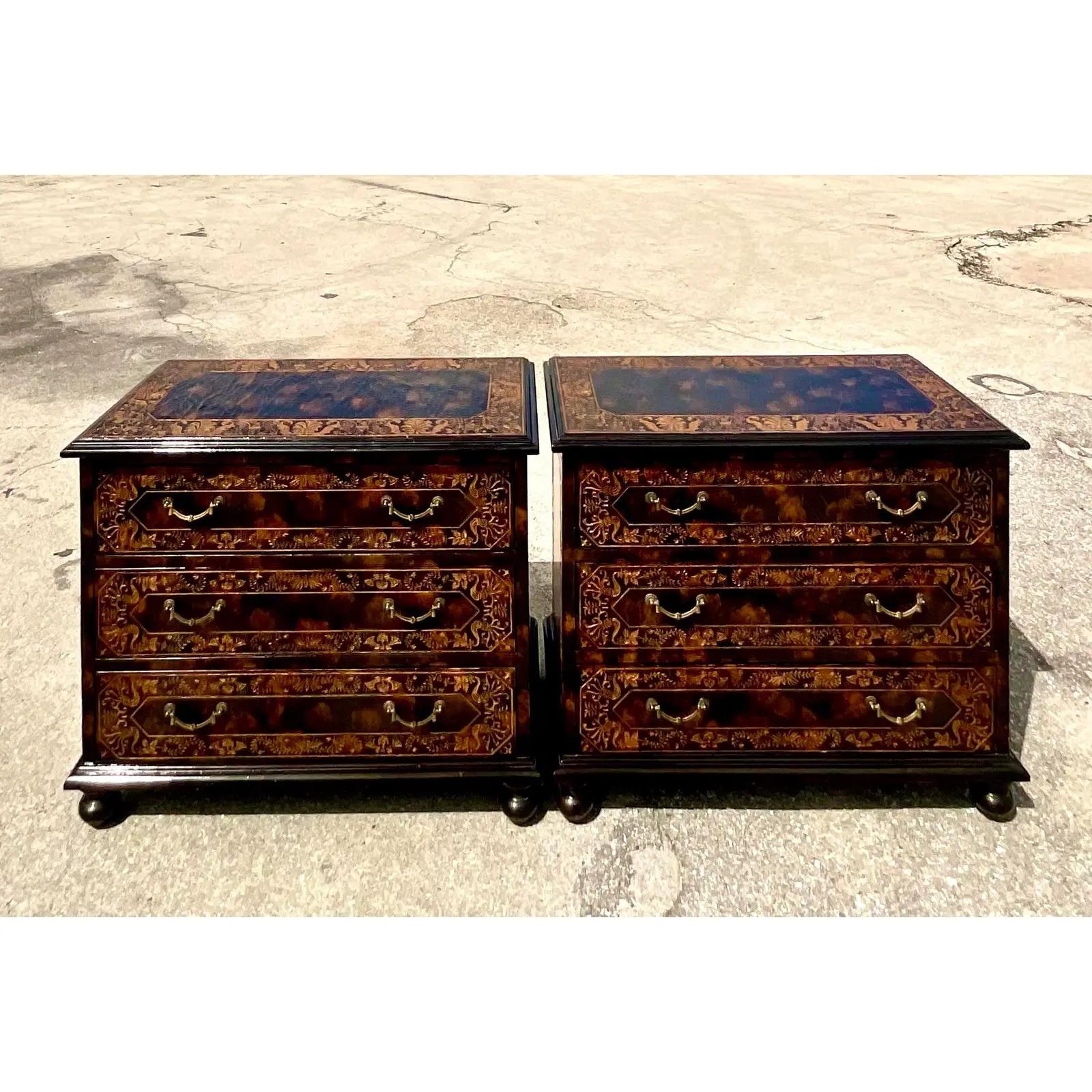 Fantastic pair of vintage Regency chests. Made by the iconic Sarreid group. Hand carved detail with a chic tortoise shell finish. Perfect as chests or even great as larger nightstands. Acquired from a Palm Beach estate.