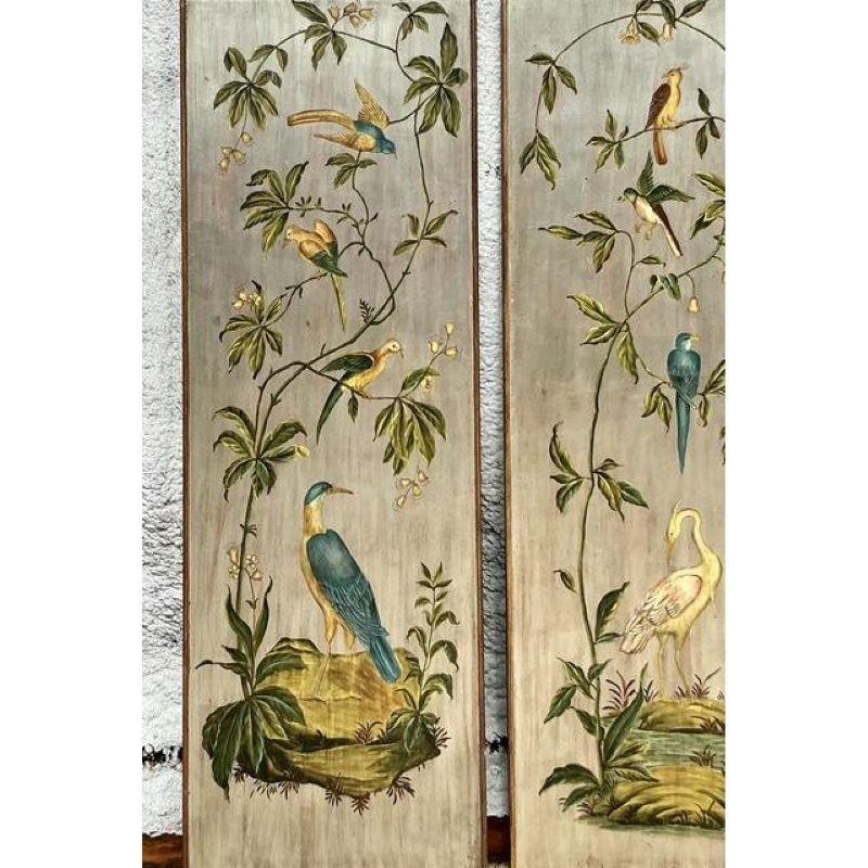 Transform your interior into a scene of serene elegance with this stunning triptych of hand-painted Chinoiserie panels. A true statement of artistic luxury, each panel depicts a captivating botanical scene with exotic birds perched amidst climbing