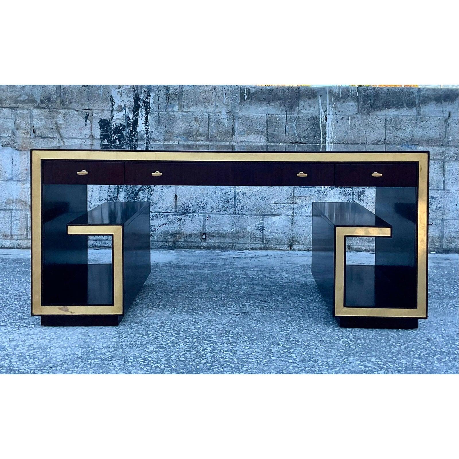 Incredible vintage Greek key executive desk. Made by the iconic Sligh group. Gorgeous gilt detail highlights the rich wood grain. Drop down front drawer panel for easy keyboard use. A real showstopper. Beautiful from both sides so will sit easily