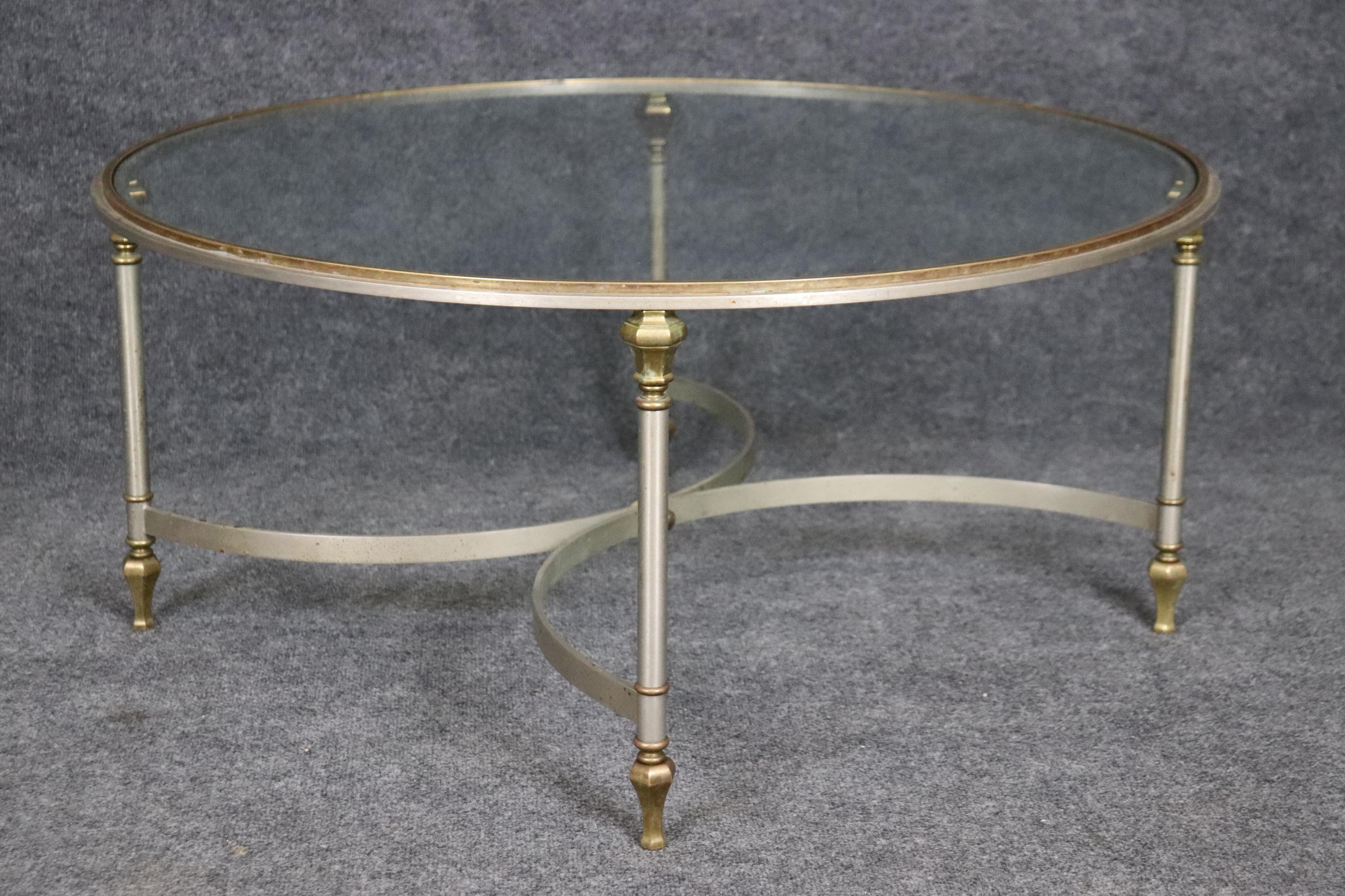 Dimensions- H: 17 1/4in W: 37 3/4in D: 37 3/4in 

This vintage Regency Maison Jansen style glass top coffee table is unique and  bound to bring a sense of sophistication and character into your home or place of choosing! This piece is made of the