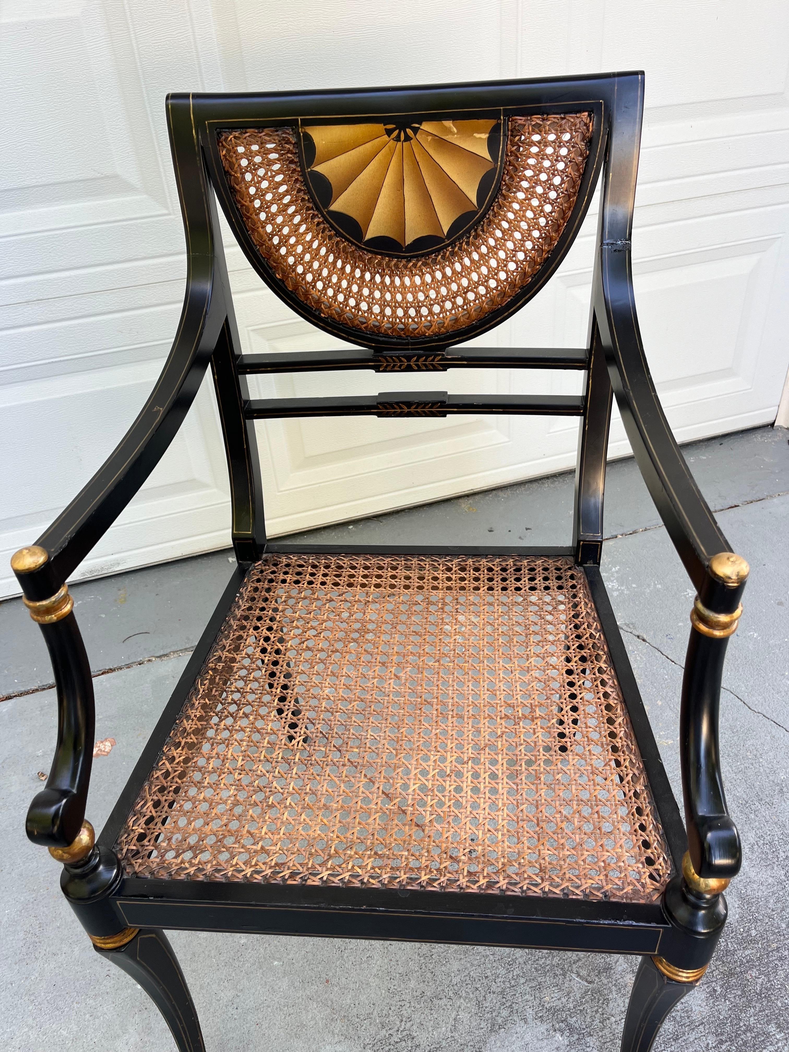 American Vintage Regency Style Ebonized Armchair with Cane Seat.
