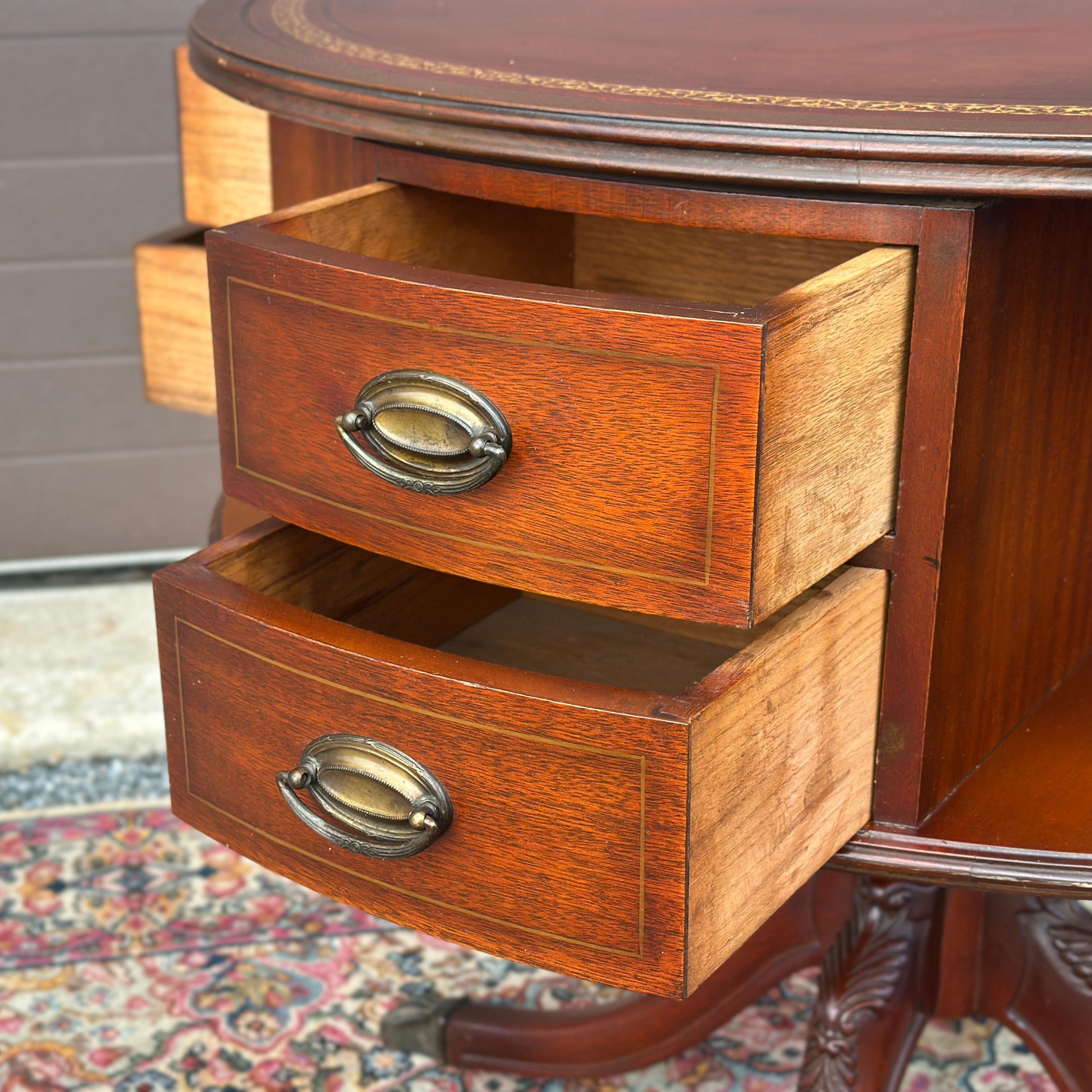 Hand-Carved Vintage Regency Style Mahogany Rotating Drum Tooled Leather Top Rent Table For Sale