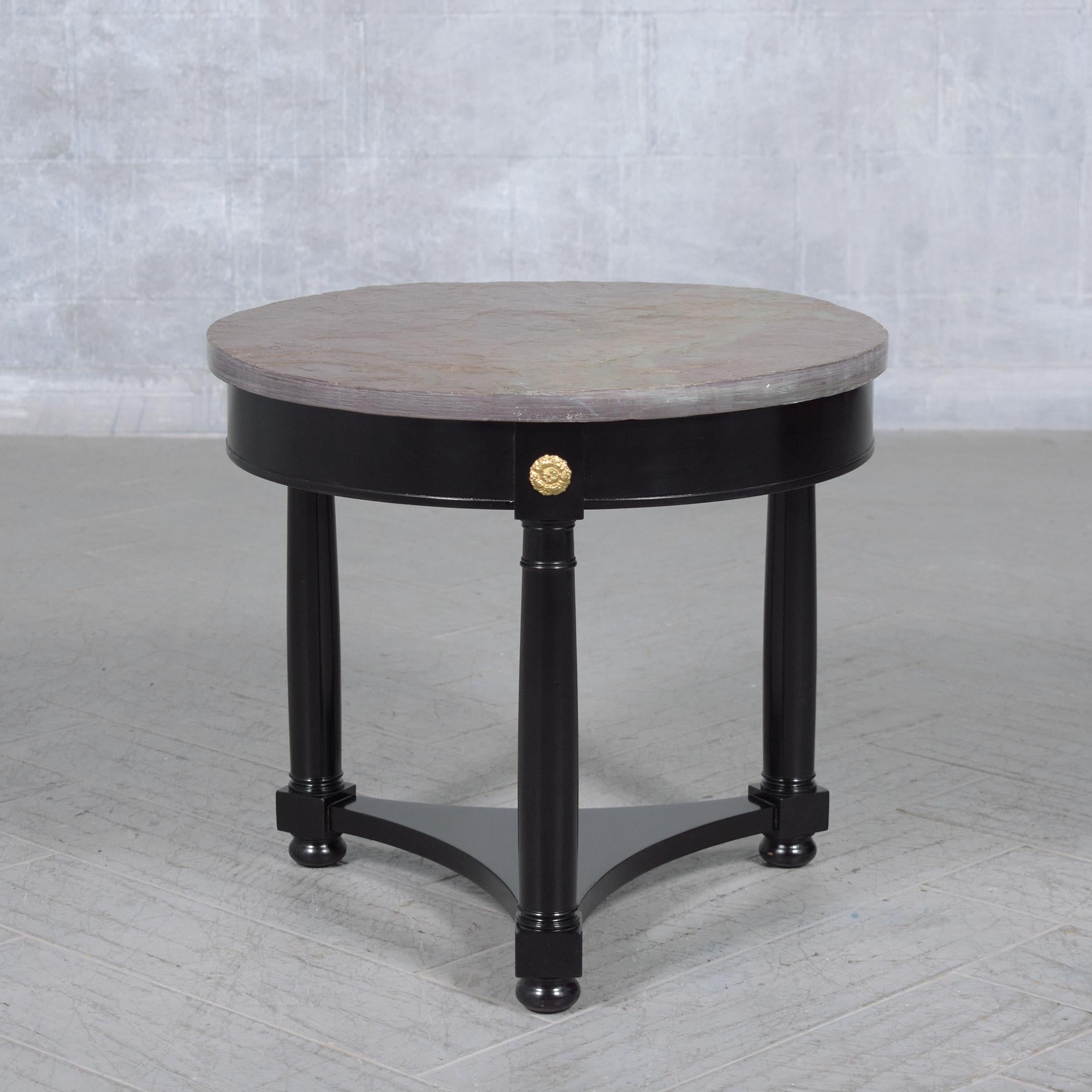 Immerse yourself in the timeless elegance of our vintage regency-style round side table, meticulously restored to showcase a perfect harmony of classic design and modern restoration. Crafted by our team of expert craftsmen, this table now stands as