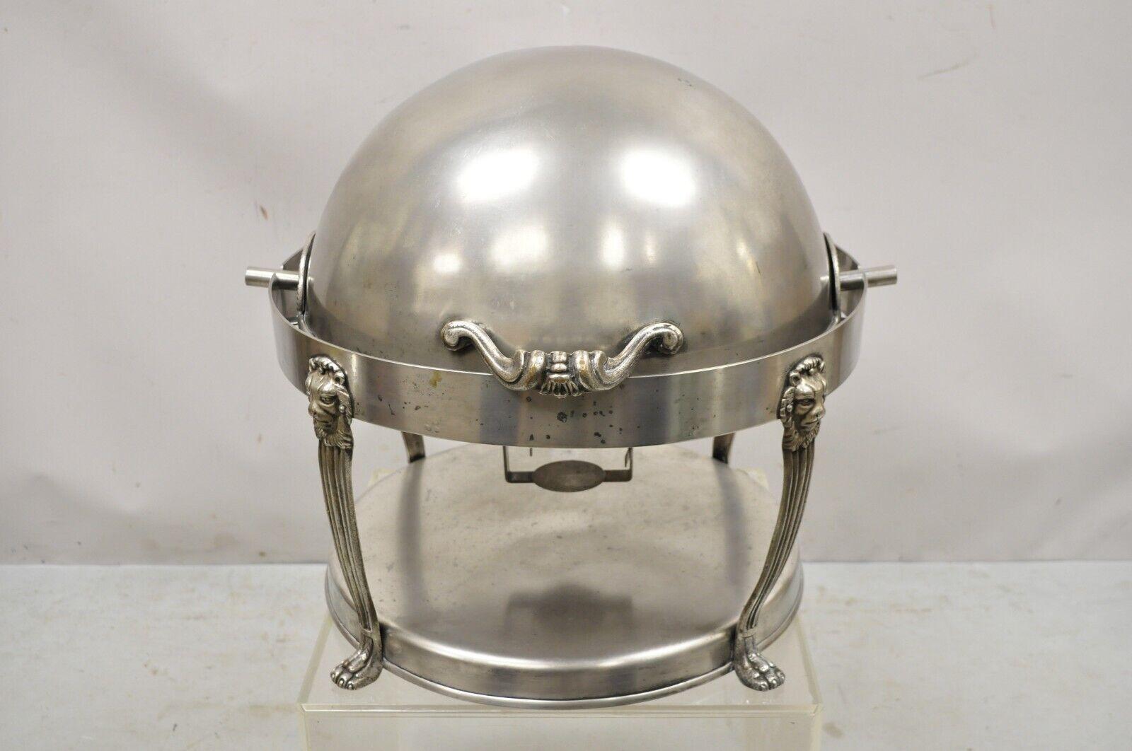 Vintage Regency Style silver plated steel Round Chafing dish service piece with Lions. Item features a removable interior divider, lion paw feet, lion heads, ornate handle, dome top, very nice vintage item, great style and form. Circa Early to Mid