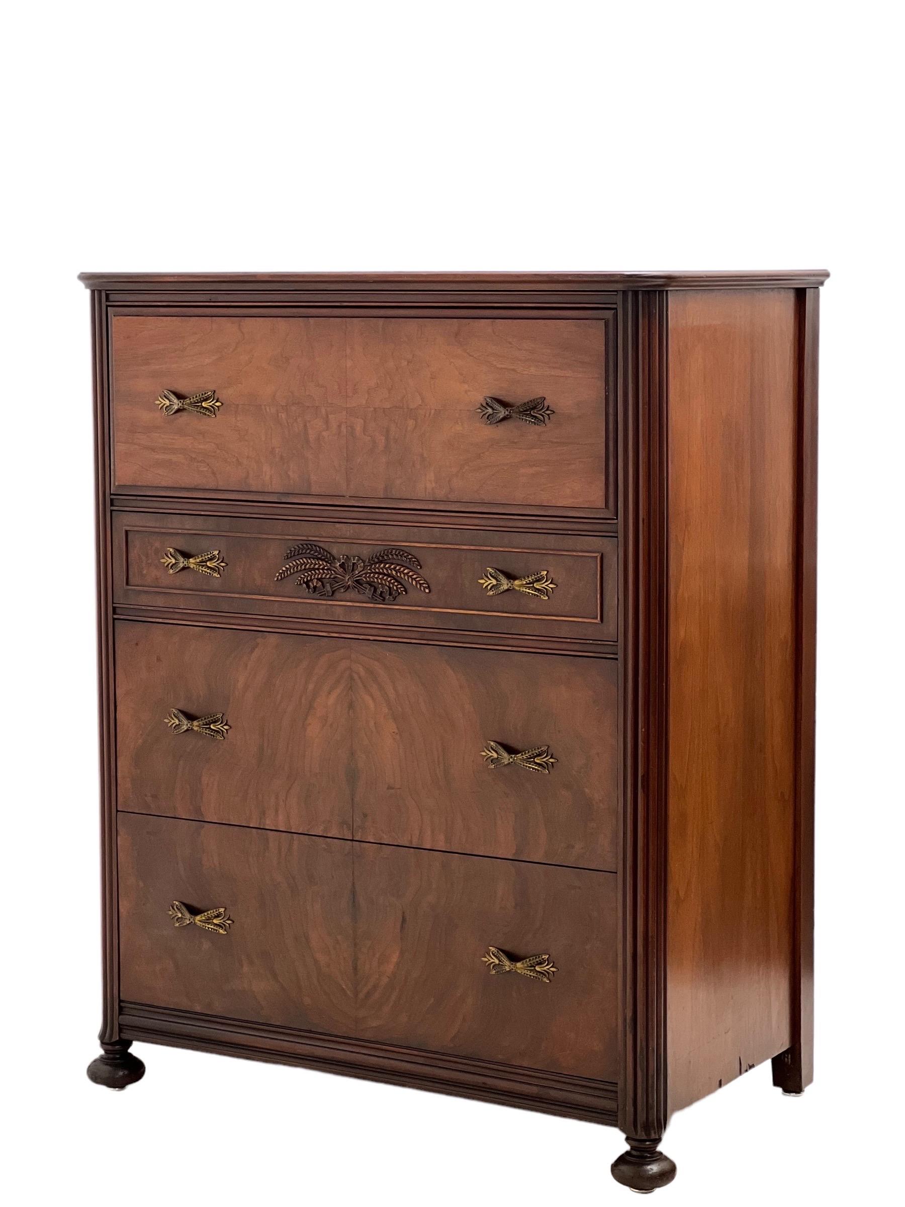 Vintage Regency style Walnut and Mahogany burl wood dresser with ornate handles and details

Dimensions: 32 W 19 D 40 H.