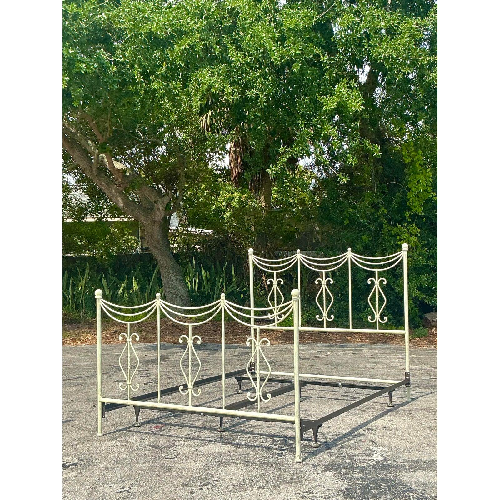 Elevate your bedroom with this timeless Vintage Regency swag metal queen bed, featuring ornate scrollwork and a romantic draped motif that echoes classic Hollywood glamour. Its sculptural frame, finished in a charming antique white, showcases