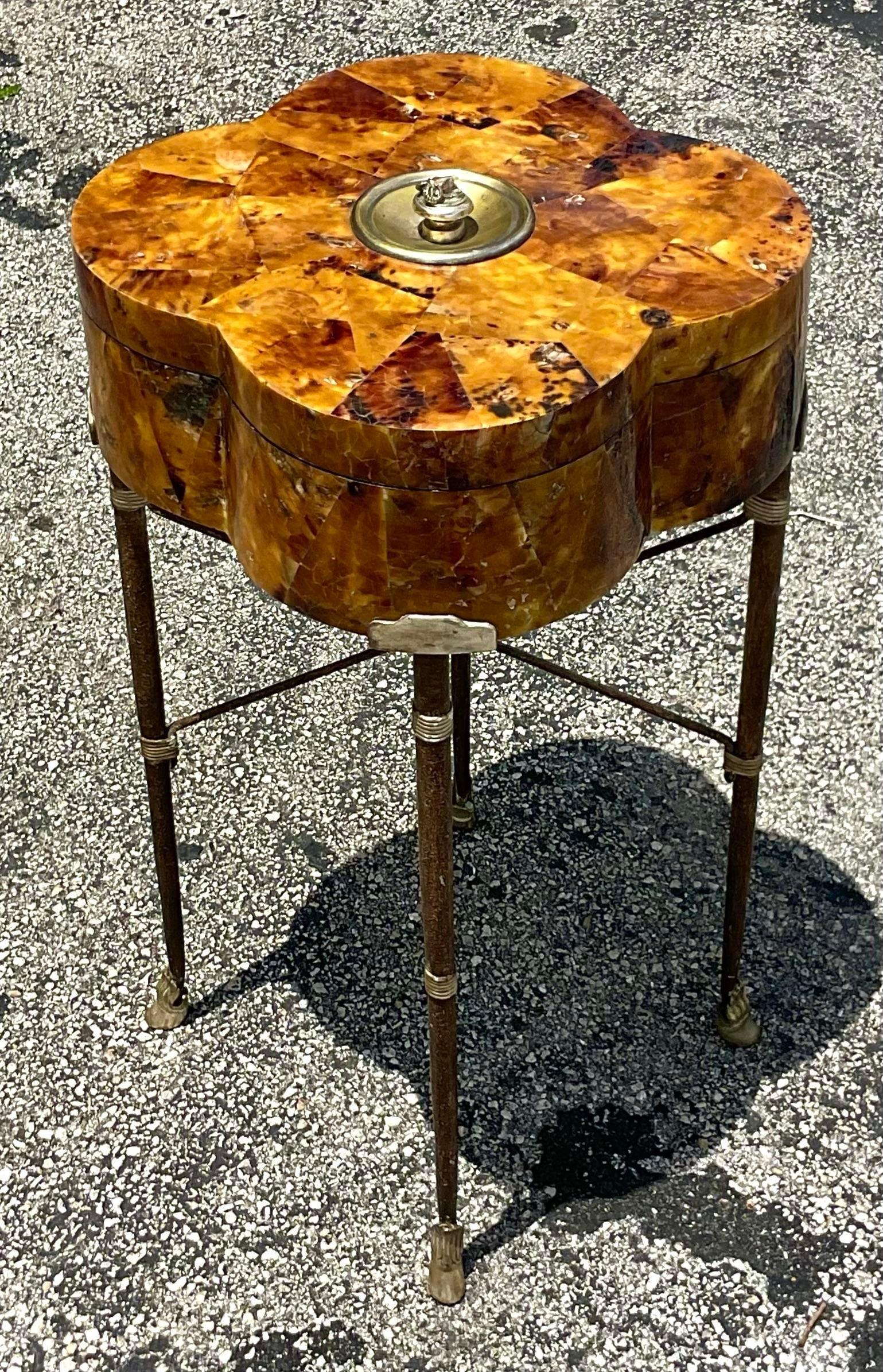 Elevate your living space with the Vintage Regency Tessellated Horn Lidded Box Side Table. Crafted with meticulous attention to detail in the USA, this exquisite piece seamlessly blends regal elegance with American craftsmanship, offering a