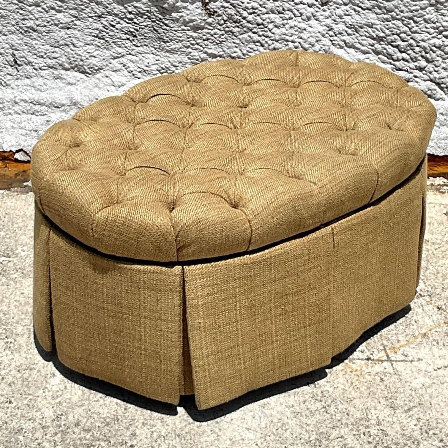Indulge in classic sophistication with this Vintage Regency Tufted Oval Ottoman. Boasting luxurious tufted upholstery, caster feet and elegant detailing, this piece exudes timeless charm and serves as a versatile accent for any refined living space