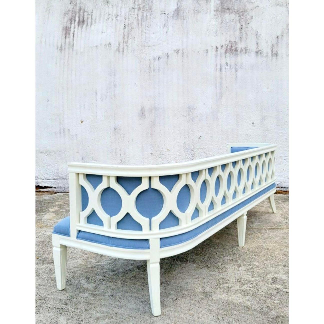 Spectacular custom vintage long tufted sofa. Gorgeous lacquered frame in a classic white with a bright blue tufted upholstery. A dramatic addition to any décor. Extra long for extra glamour. Beautiful from all sides. Can sit easily in the center of