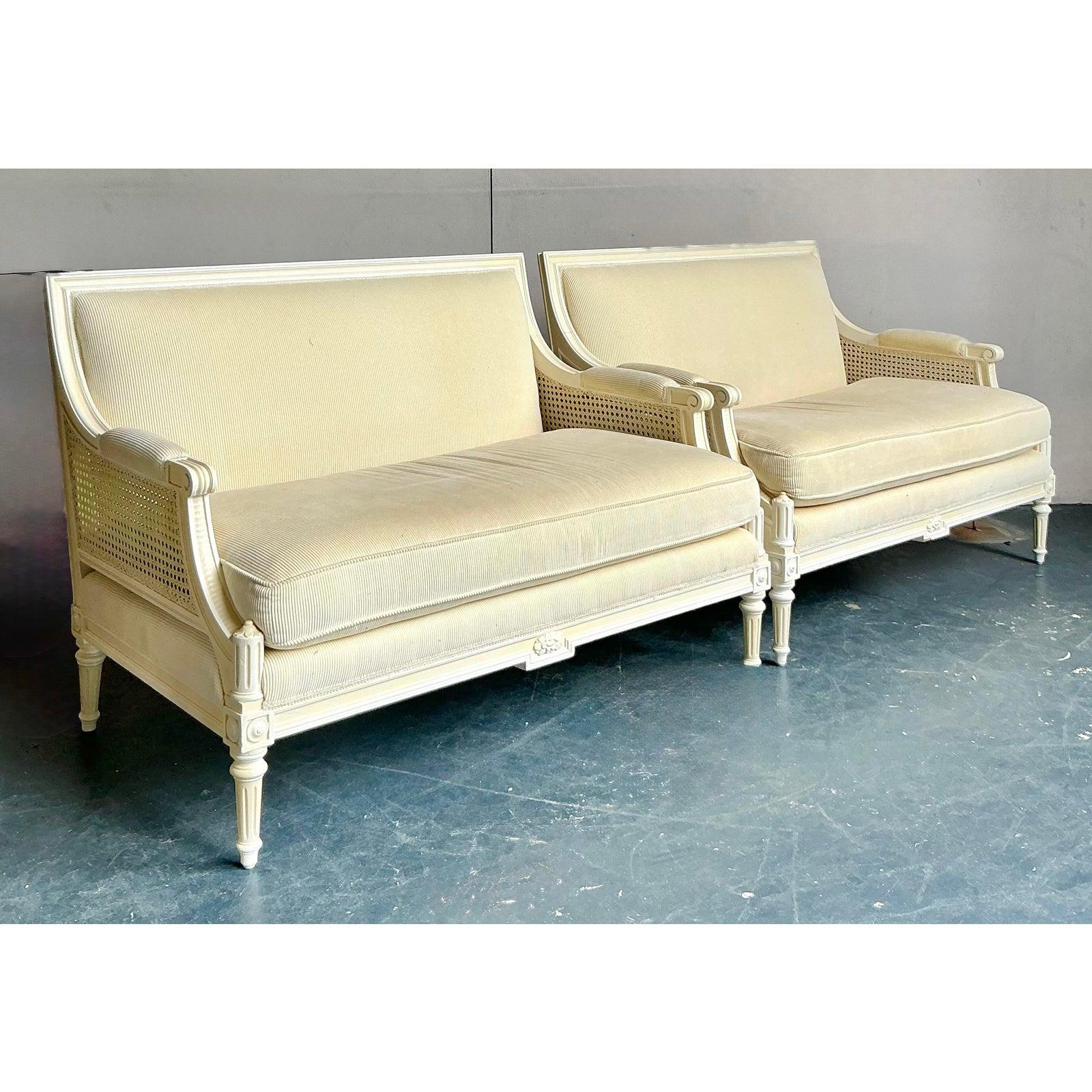 Vintage Regency Upholstered Cane Settee - A Pair In Good Condition For Sale In West Palm Beach, FL