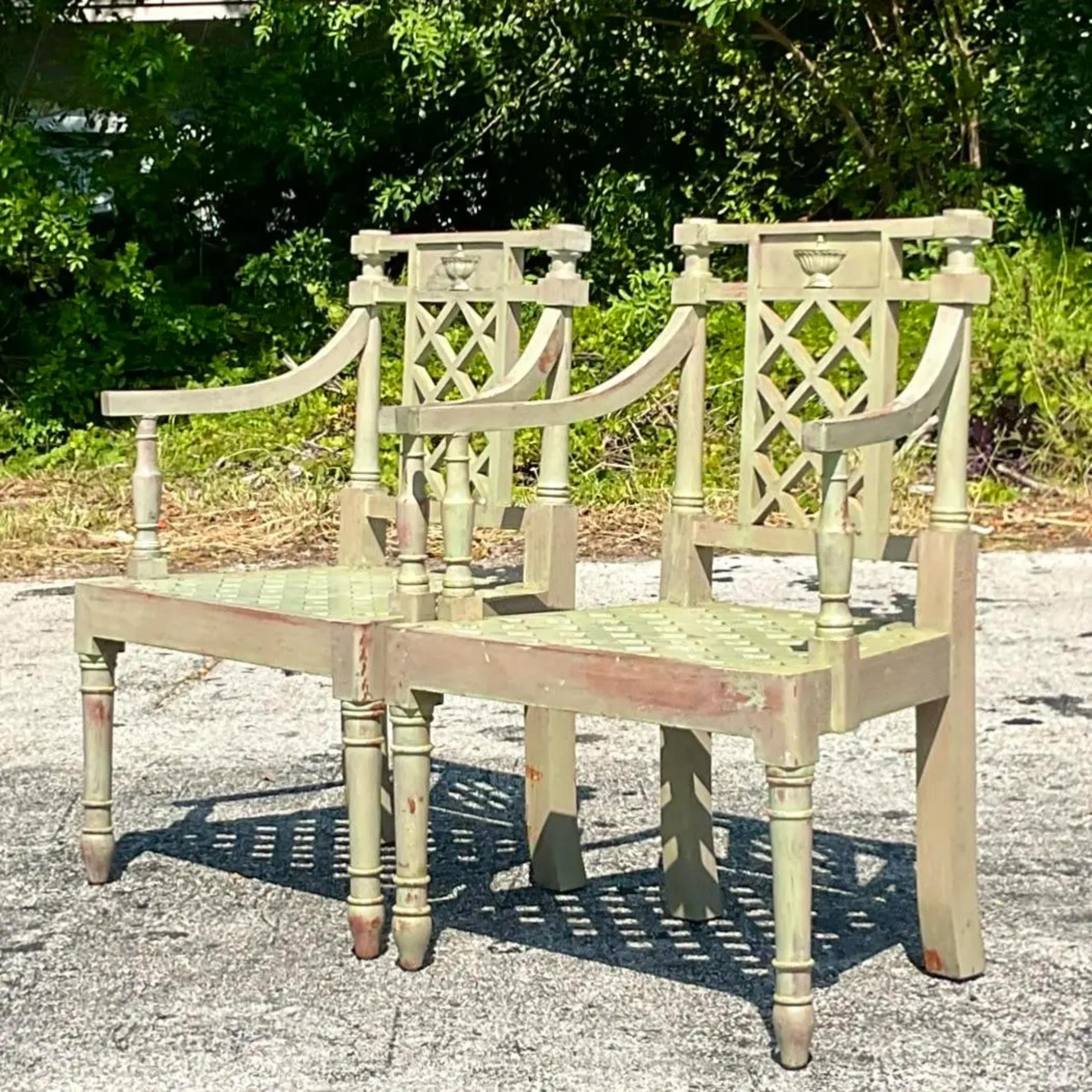 A stunning pair of vintage Regency Victorian garden chairs. A chic Hepplewhite design in a sage green wash finish. Beautiful hand carved detail. Acquired from a Palm Beach estate
