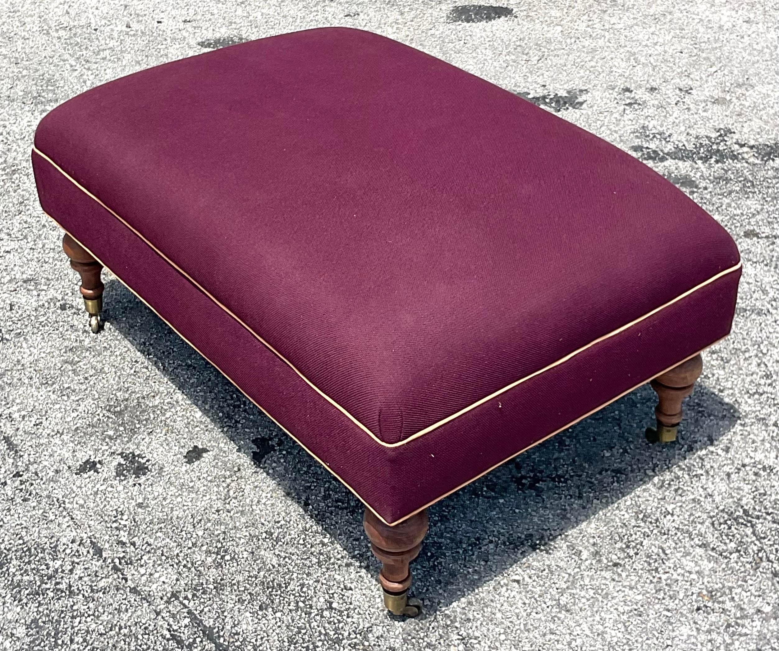 Elevate your home with the timeless elegance of this Vintage Regency Welted Ottoman. Designed with meticulous craftsmanship and classic American style, its welted detailing adds a touch of sophistication to any living space, embodying the refined