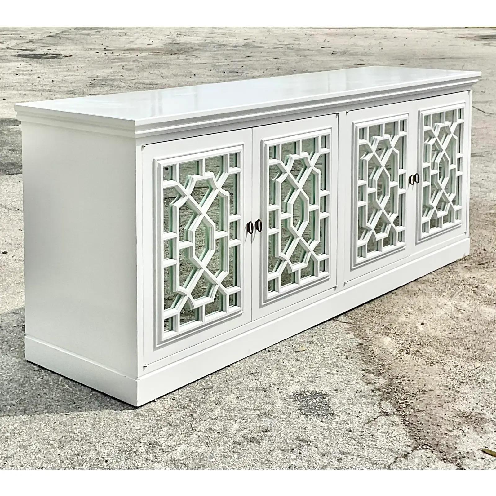 20th Century Vintage Regency White Lacquered Fretwork Mirrored Credenza