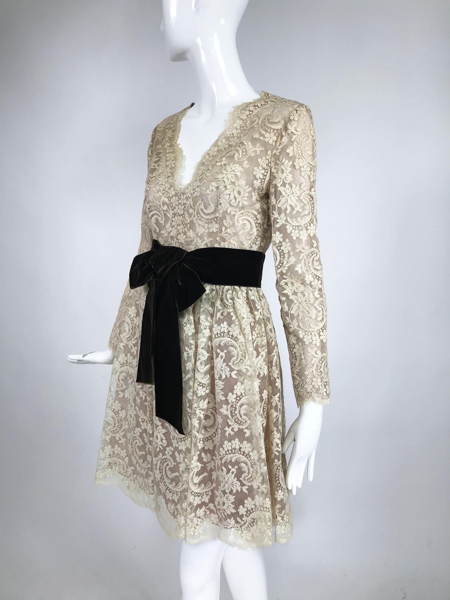 Vintage Rembrandt 1960s Cream lace baby doll dress. This is such a beautiful dress and it would make a great wedding dress! Labeled Ole Borden for Rembrandt, it has great style and is so evocative of the mid 1960s. Off white lace is layered over a
