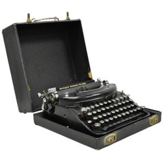 Machine à écrire manuelle portable vintage Remington « Noiseless » dans son étui de transport 90998N