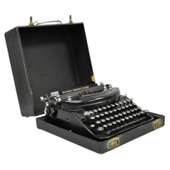 Machine à écrire manuelle portable vintage Remington « Noiseless » dans son étui de transport 90998N