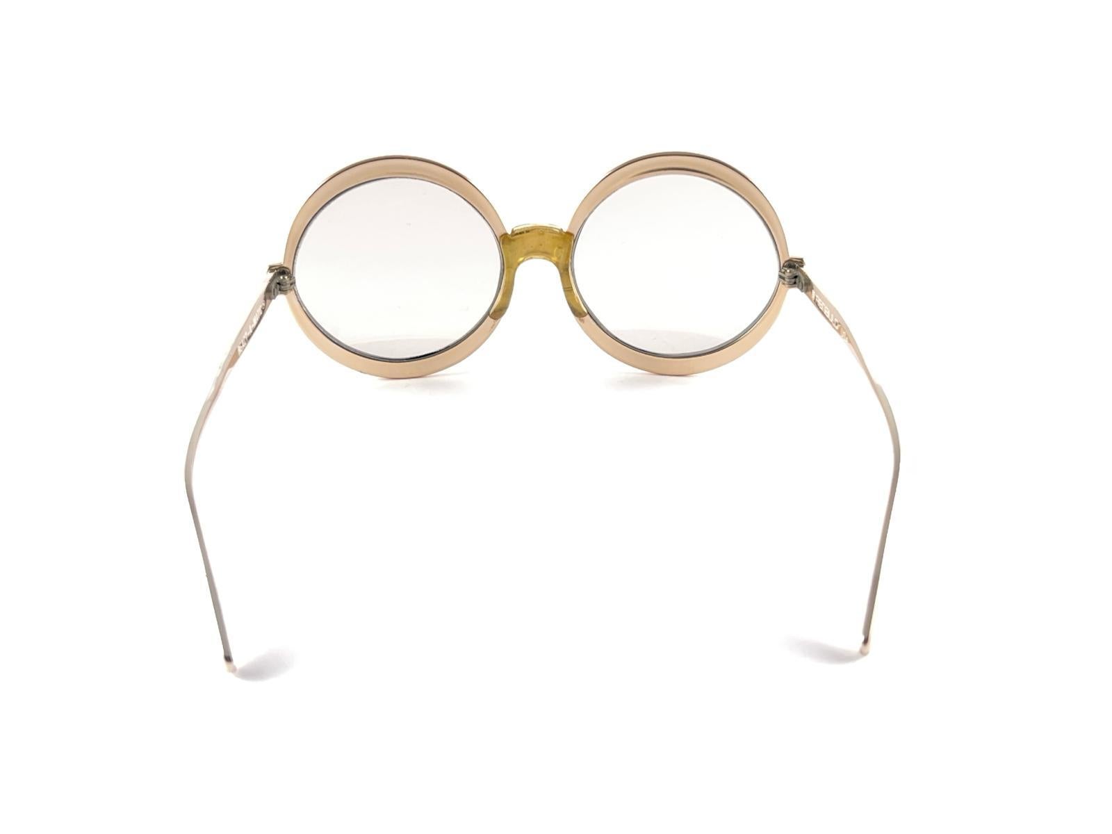 Gafas de sol vintage Renauld redondas doradas metalizadas años 80 Made in USA en venta 3
