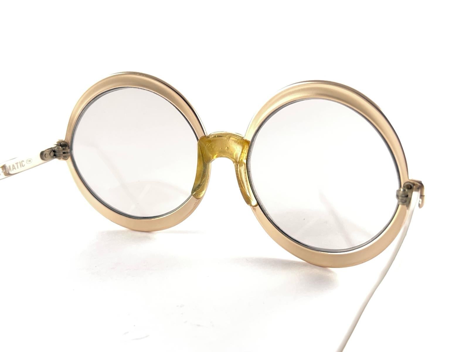 Gafas de sol vintage Renauld redondas doradas metalizadas años 80 Made in USA en venta 4