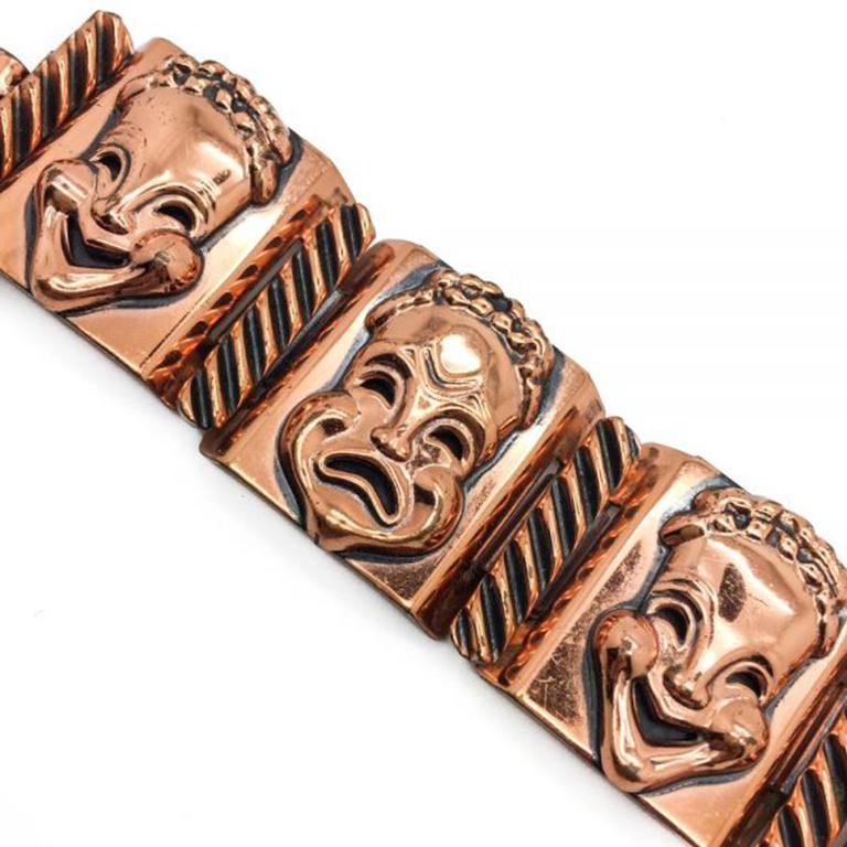 A very quirky signed vintage Renoir bracelet. The signature dating it to pre 1954. This piece is named 'Curtain call' by Matisse. These theatre mask pieces are stand out in the range that was produced by Renoir and often highlighted in specialist