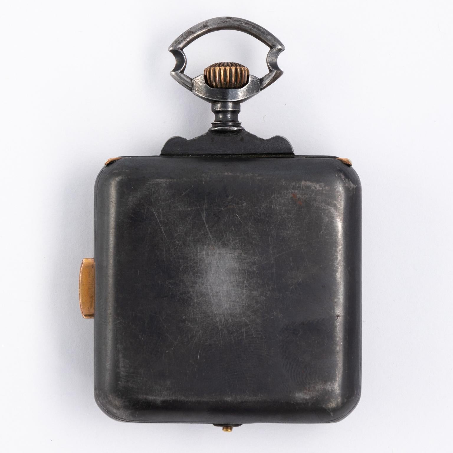 Circa early 20th century square case quarter repeater pocket watch by A.B. Gorant with a hinged back. When the side putton is pressed, it activates a chime. Case is composed of a silver toned cast metal.
