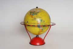 Vintage Replogle Yellow and Red Tin Litho "Globe Grams' Spinning World Globe