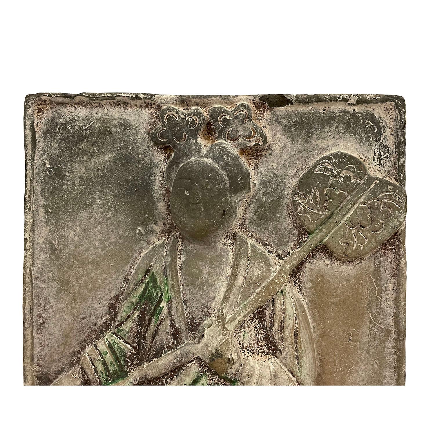 Look at this magnificent Chinese Antique Clay Beauty Mural Brick. It was hand made reproduction from Tang Dynasty. This Mural Brick has very detailed handcrafted beauty arts on it with an honor fan held in her hands. You can see from the pictures