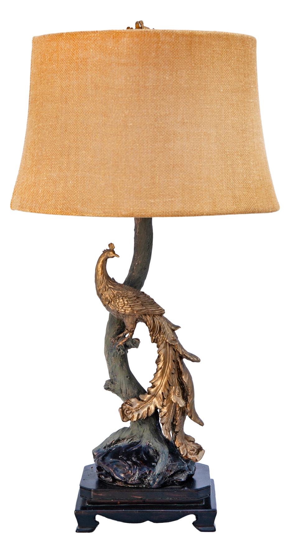 Unusual & elegant lamp.
A peacock base constructed of cast resin, hand painted after market. Cast bronze finial is included.
New Pottery Barn burlap shade is included.