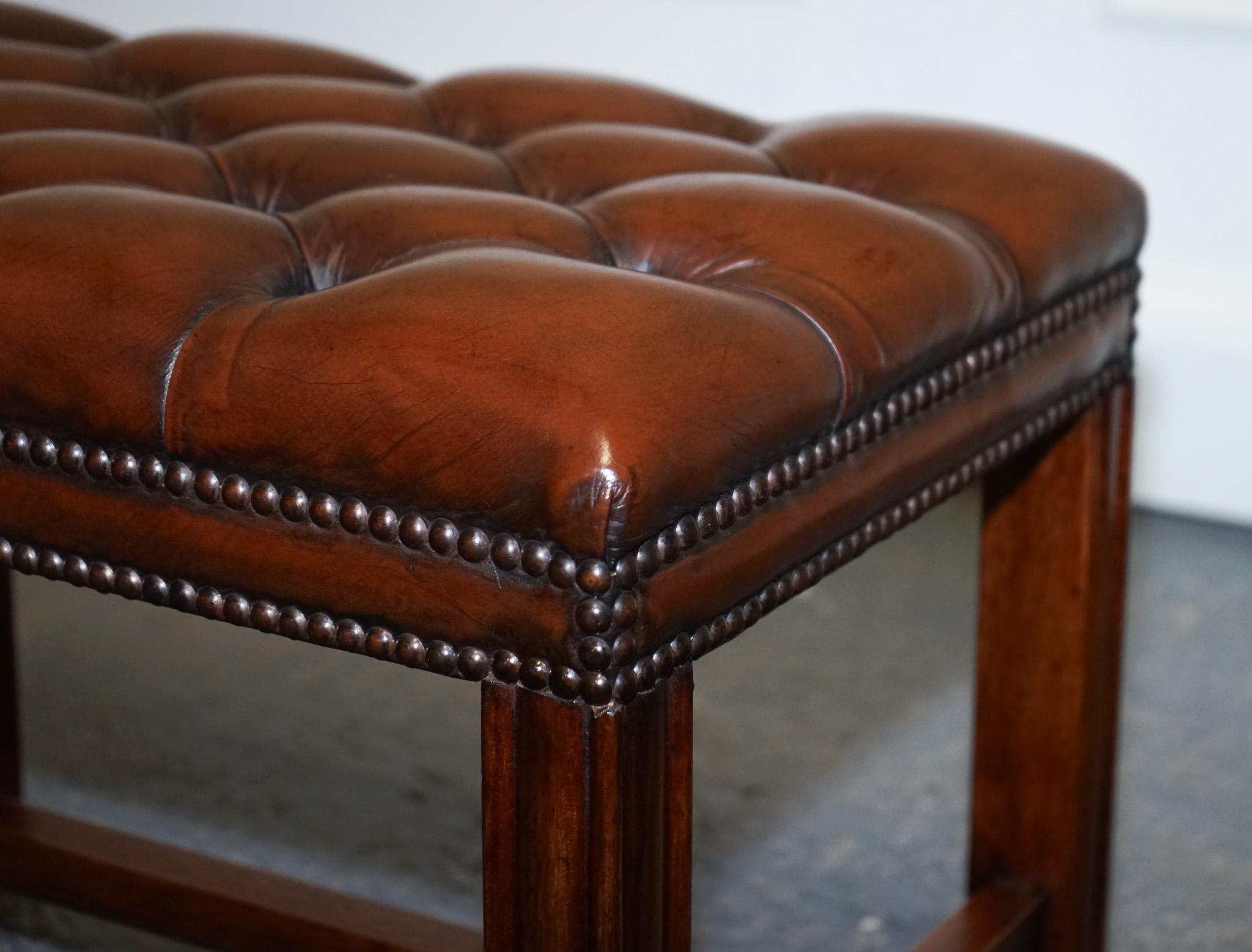 20th Century VINTAGE RESTORED CHESTERFiELD HAND DYED BROWN LEATHER TUFFED FOOTSTOOL (1/2) For Sale