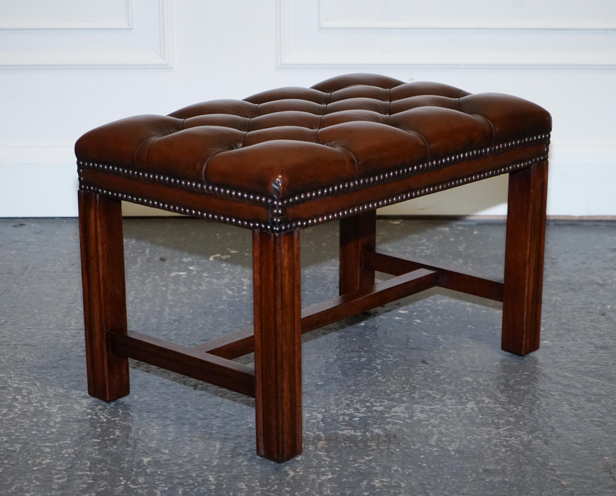 Leather VINTAGE RESTORED CHESTERFiELD HAND DYED BROWN LEATHER TUFFED FOOTSTOOL (1/2) For Sale