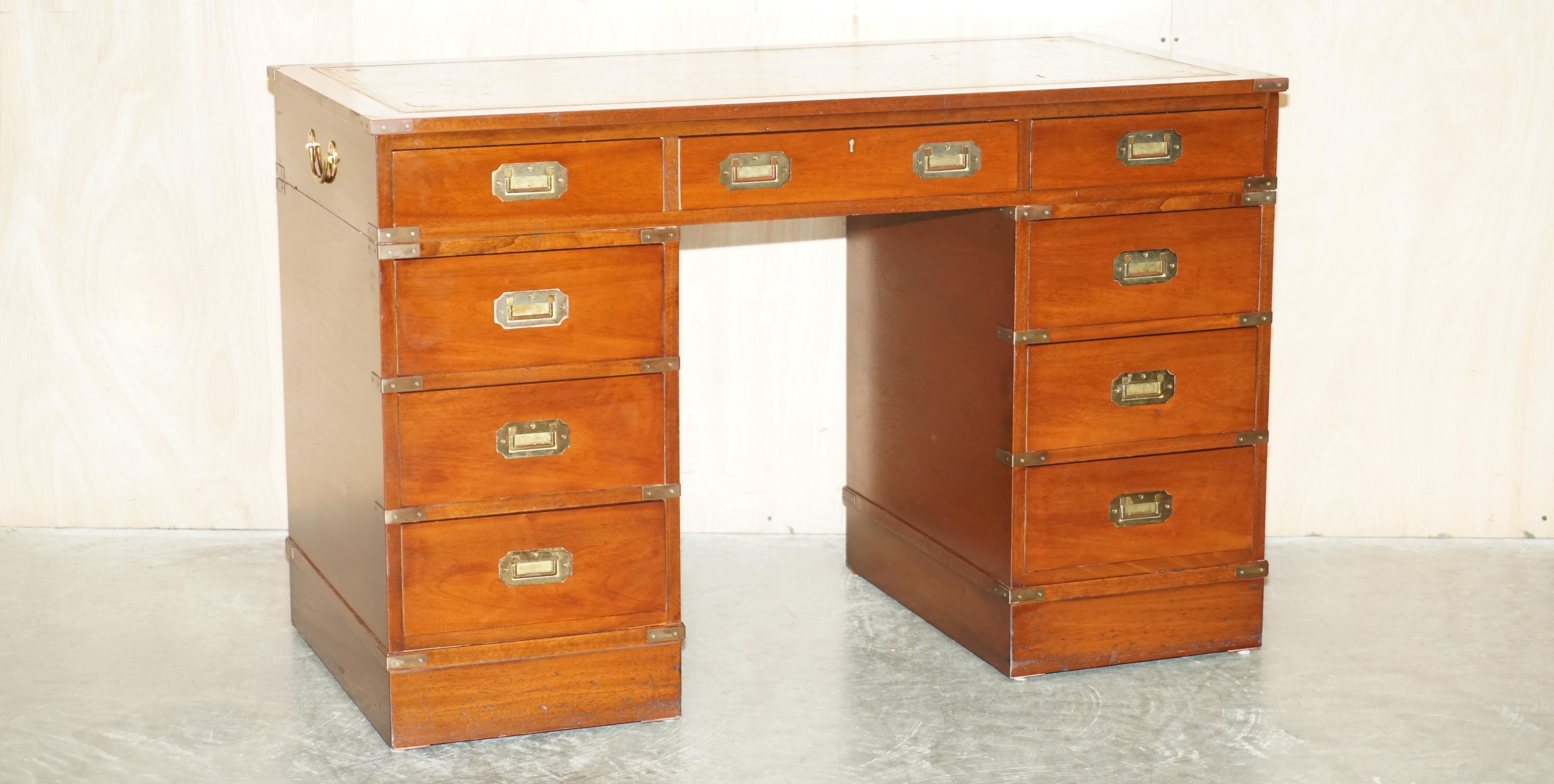 We are delighted to offer for sale this lovely vintage, Harrods London retailed, REH Kennedy made, Military Campaign twin pedestal partners desk with brown leather writing surface

This is a wonderful find, quite rare in the sense that its all