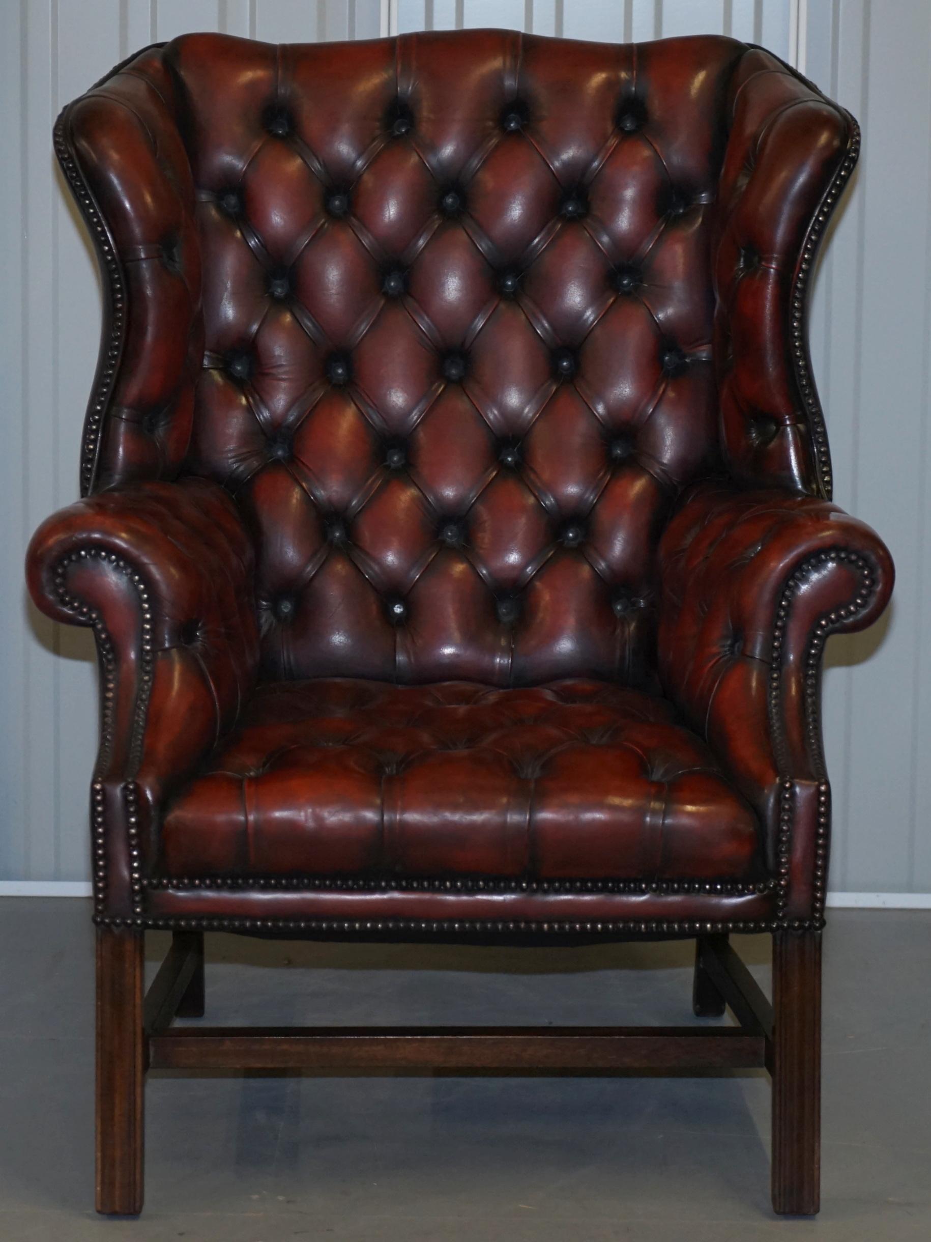 We are delighted to offer for sale this stunning fully restored vintage chesterfield tufted oxblood leather wingback armchair

This chair is a real tour de force, it has absolutely everything going for it, the leather hide is original and hand