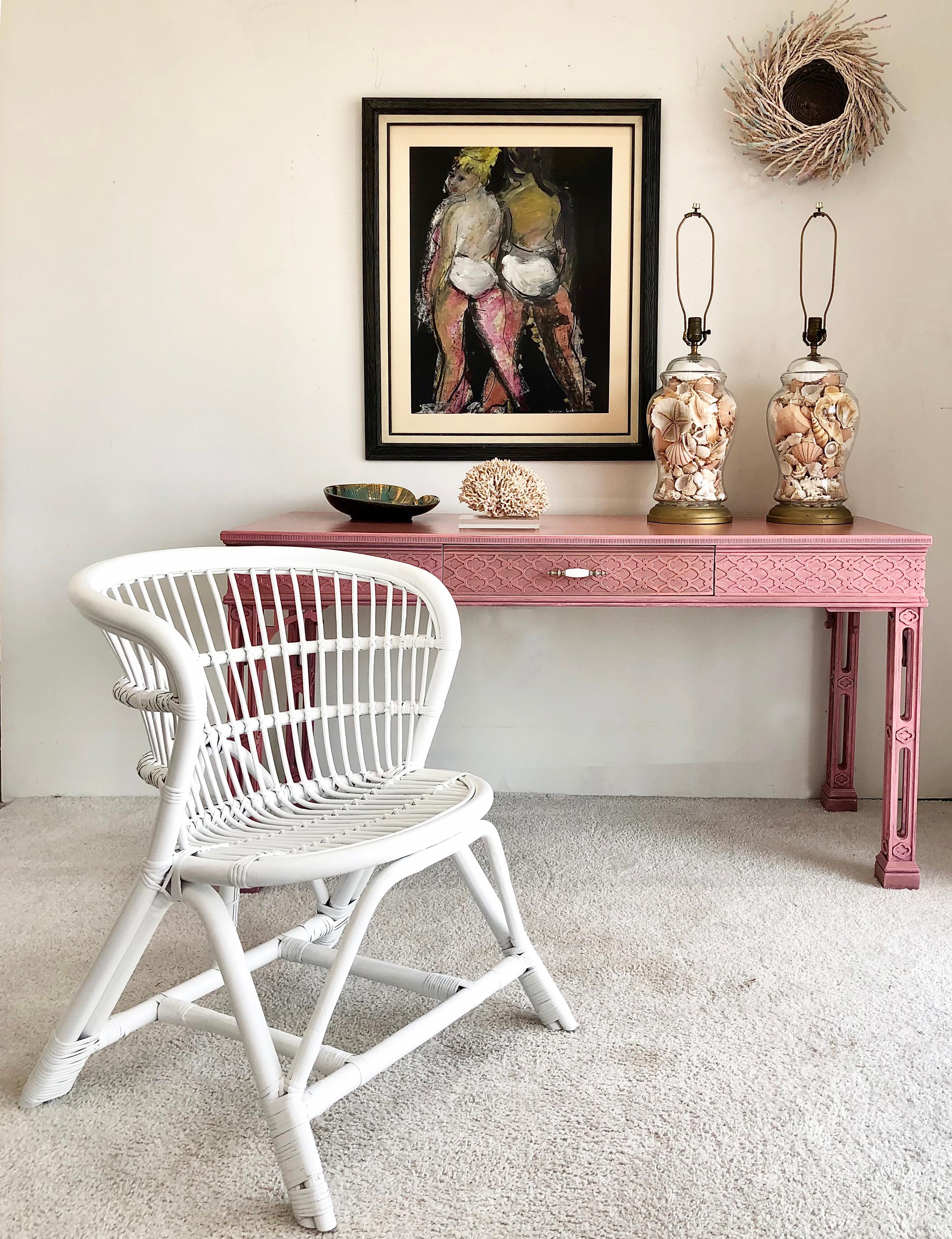 Vintage restored palm beach Regency desk writing table

Offered for sale is an elegant Palm Beach Regency writing table desk with a single center drawer. The desk has carved legs with fretwork and has been newly refinished in a fresh pink stain