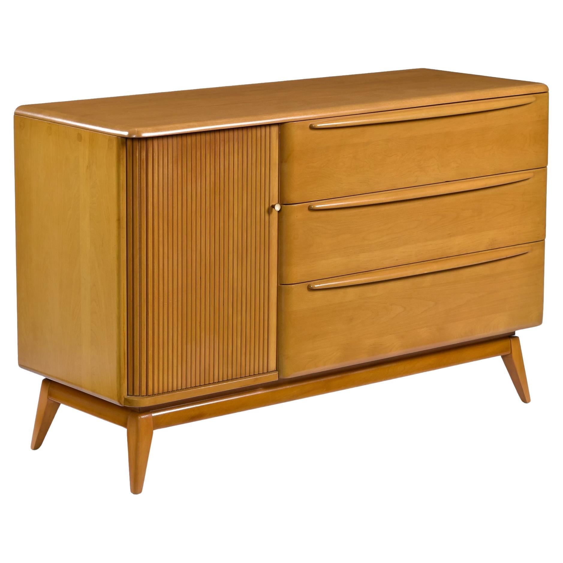 (1) Heywood Wakefield Tambour Door Credenza
(1) Heywood Wakefield Desk
(1) Heywood Wakefield Cats Eye Chair