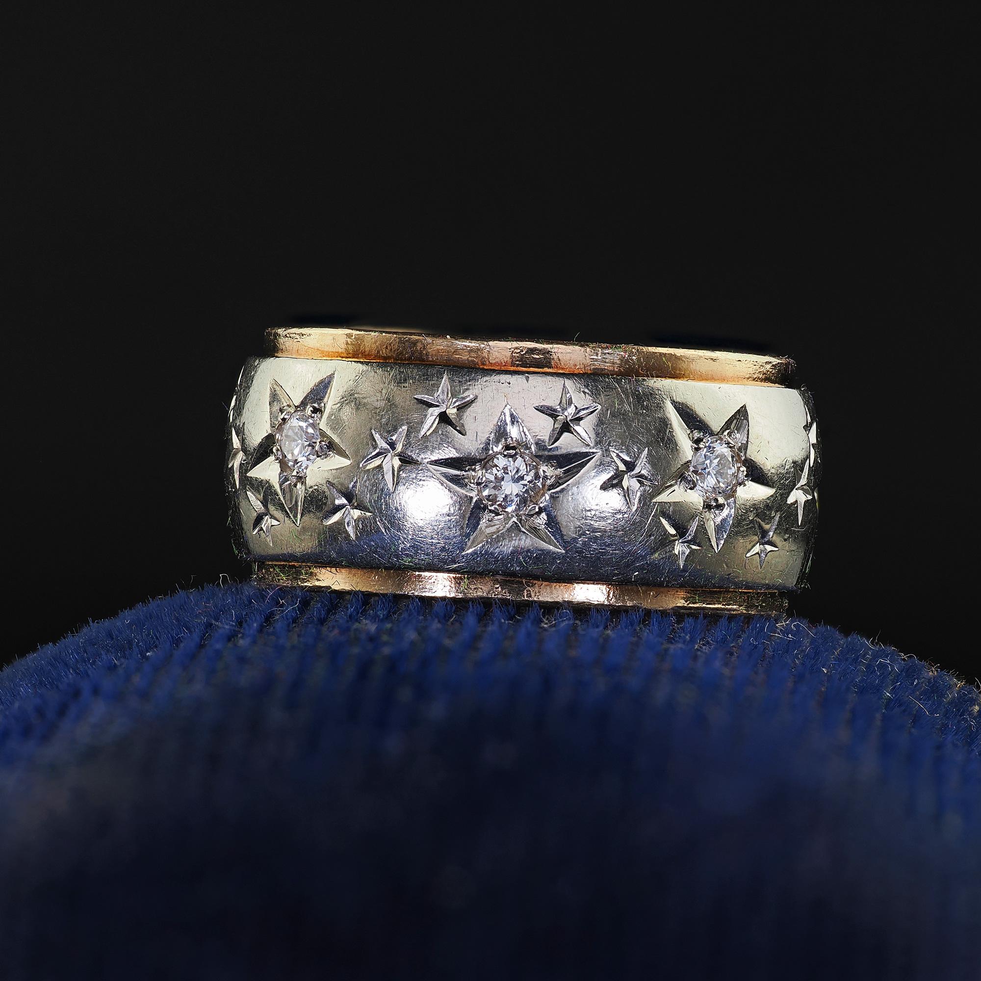 Beautiful Vintage Retro 14K Two Tone Diamond Star Set Wide Wedding Band - Size 5. This incredible Retro diamond wedding band is crafted in 14k yellow and white gold. The ring features diamonds set throughout the band in a star setting design. The