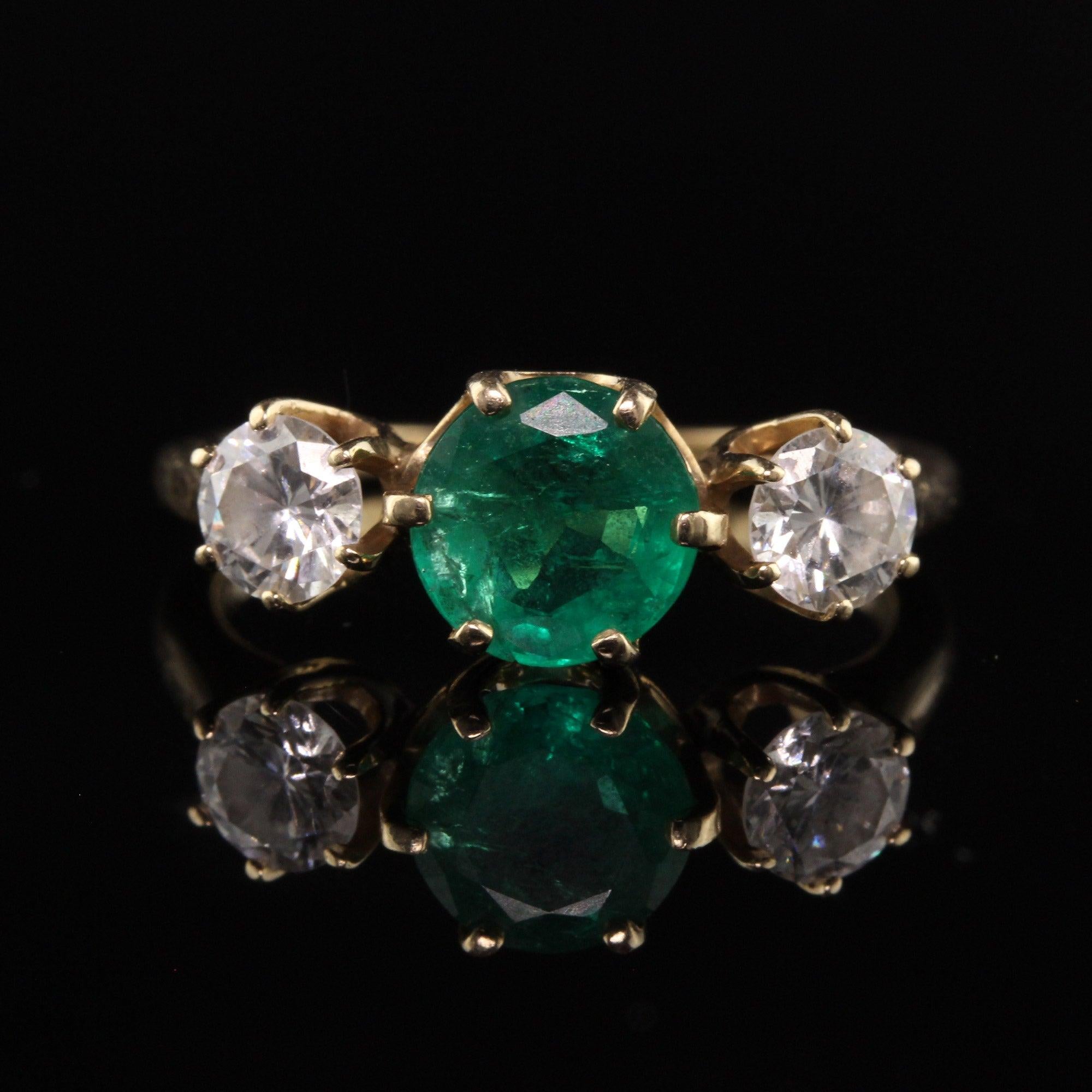 Vintage Retro 14K Yellow Gold Emerald and Diamond Three Stone Ring In Good Condition For Sale In Great Neck, NY