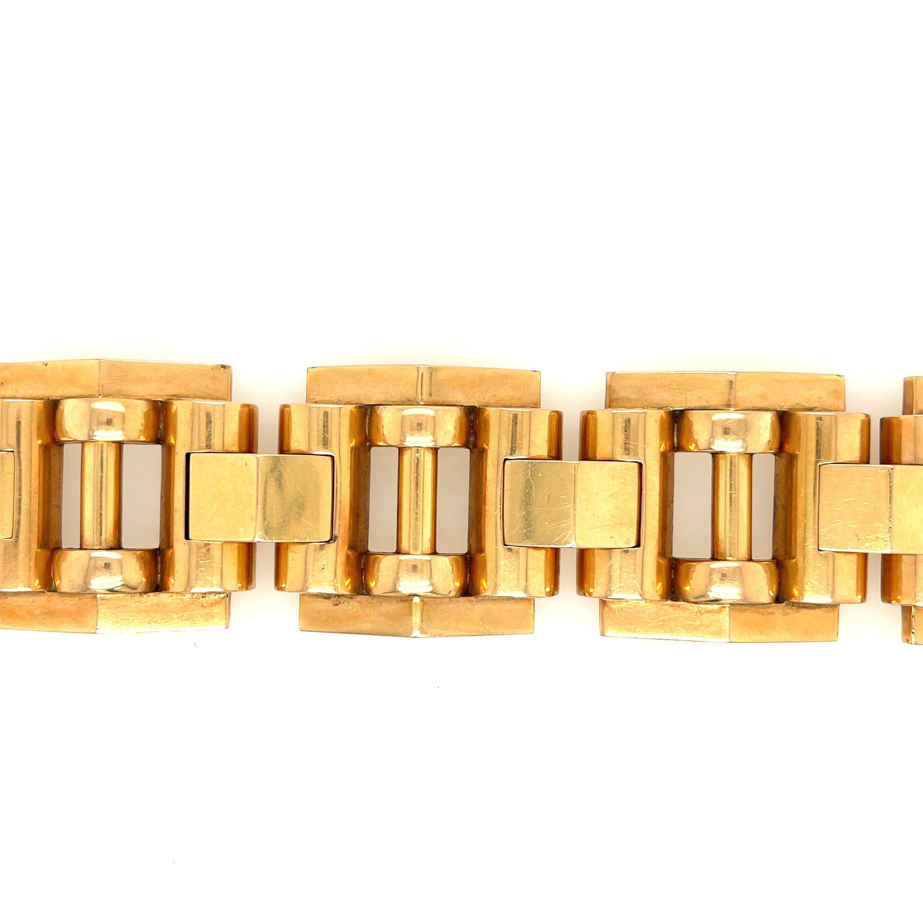A bold 18k yellow gold Retro tank link bracelet circa 1940. This bracelet has a nice dimensional link and is a nice wide bracelet. Such bracelets are referred to Tank bracelets because during WWII when these bracelets were quite popular they were