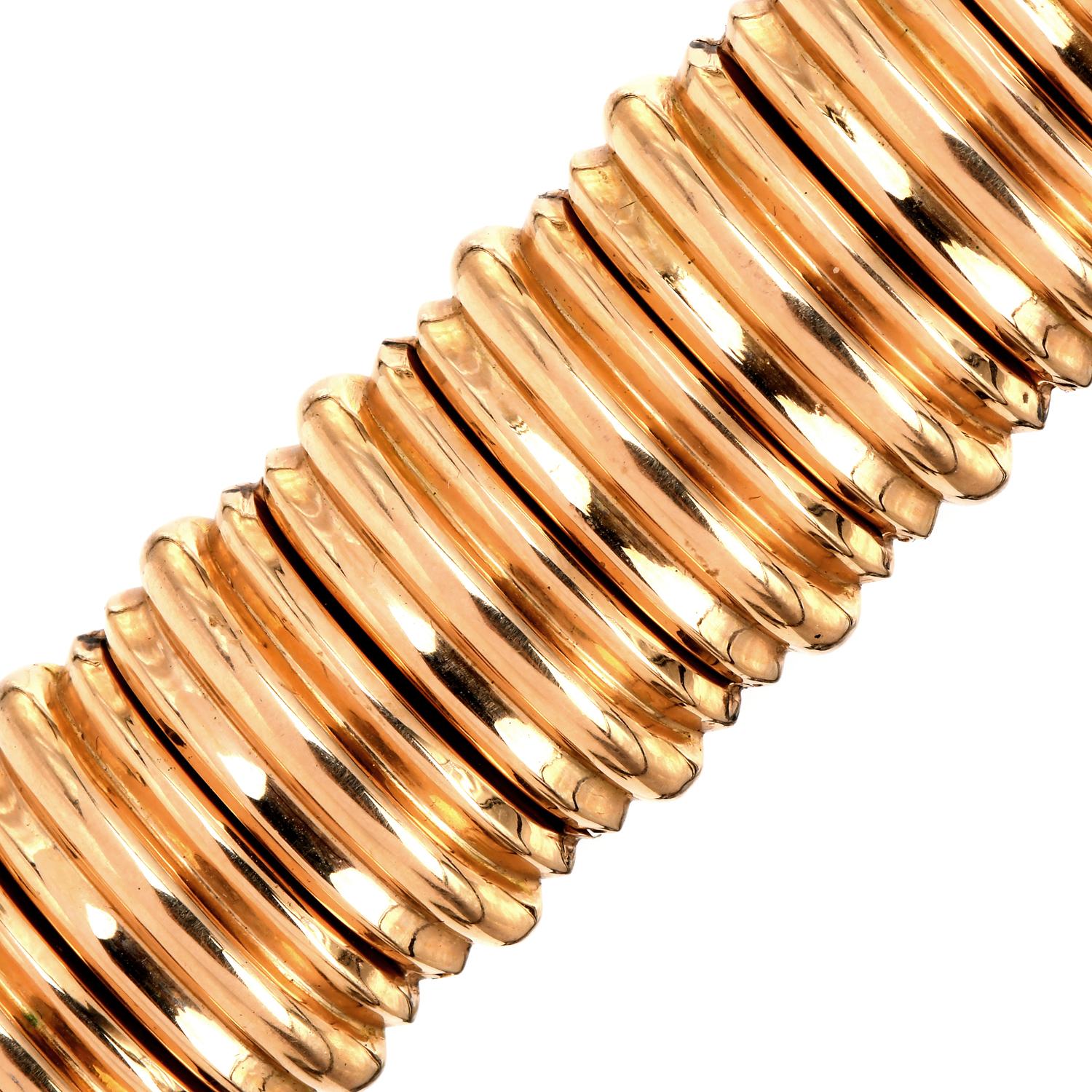 Add instant luxury to any outfit with this wide Vintage flexible 18K rich yellow gold Link Bracelet.

This piece measures 24mm in width and is appx. 7.25 inches long.

Bright, highly polished, channeled design links run throughout.

It is secured