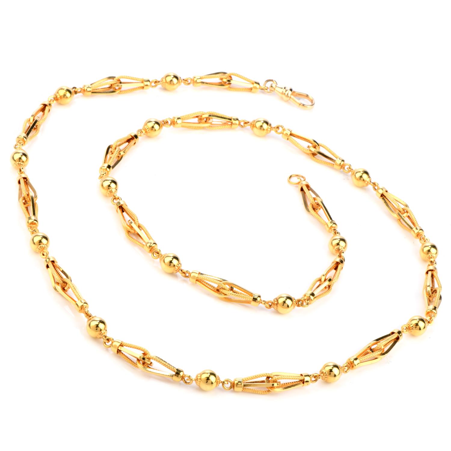 This fun loving Vintage retro 1950's long Gold Chain Necklace was inspired in an Geometric Sphere motif 

crafted in 18K gold. Draping down the neckline is 28 inches of gold links.

Measuring 6mm x 28 Inches.

Weighing appx. 40.1 Grams.

Excellent