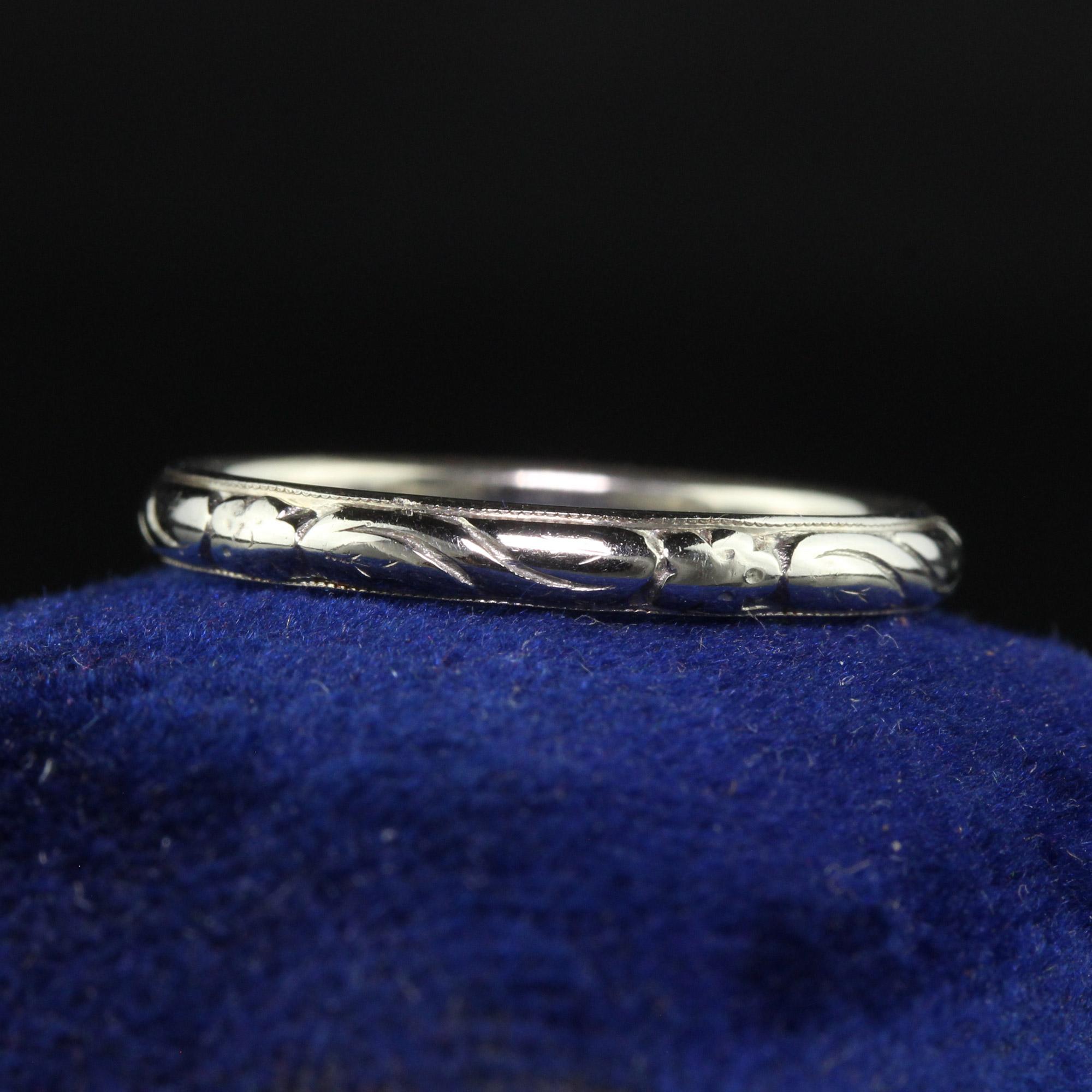 Beautiful Vintage Retro 18K White Gold Engraved Wedding Band - Size 7. This beautiful wedding band is crafted in 18k white gold. The outside of the band is beautifully engraved around the entire ring and is in great condition. The ring sits low on