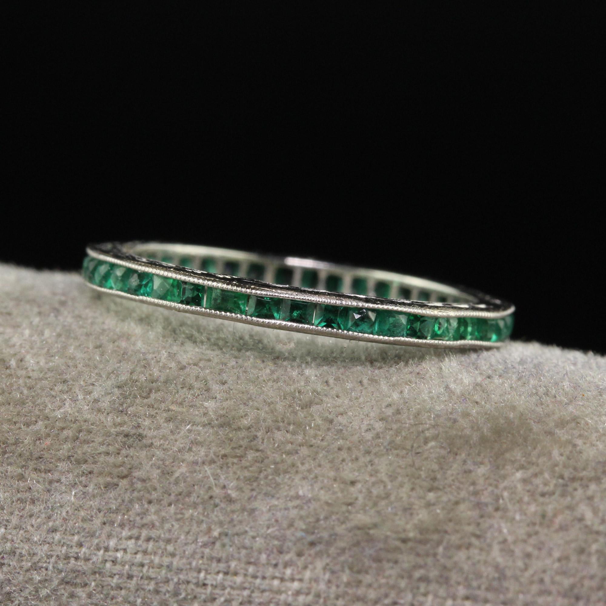 Beautiful Vintage Retro 18K White Gold Square Cut Emerald Engraved Eternity Band - Size 6 1/2. This beautiful wedding band is crafted in 18k white gold. There are a mix of natural and synthetic emeralds in this band going around the entire ring. The