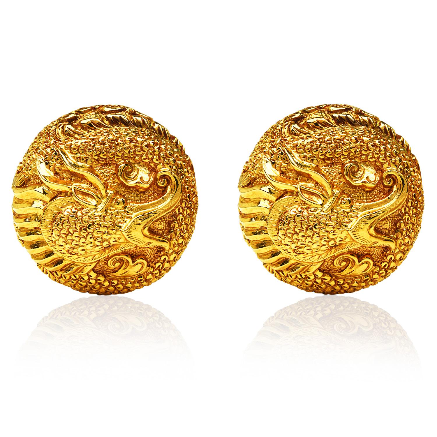 Enjoy the luxury look from these Asian Dragon-inspired, round-shaped earrings.

Showing a powerful theme and craftmanship, Crafted in 18K yellow gold, finished in a textured high polished gold.

Each piece measures approximately 1.25