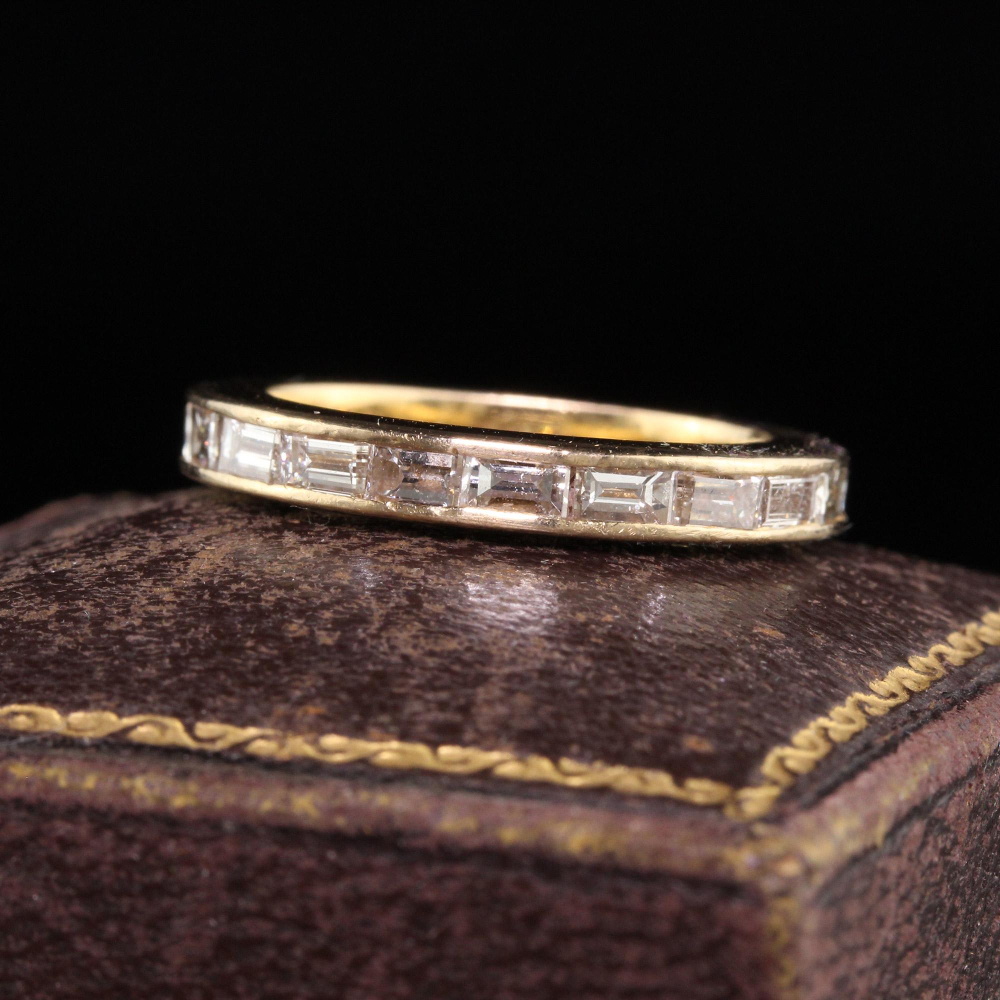 Beautiful Vintage Retro 18K Yellow Gold Baguette Diamond Eternity Band - Size 5. This beautiful eternity band is crafted in 18k yellow gold. The band holds beautiful baguette diamonds going around the entire ring and has one diamonds that is square