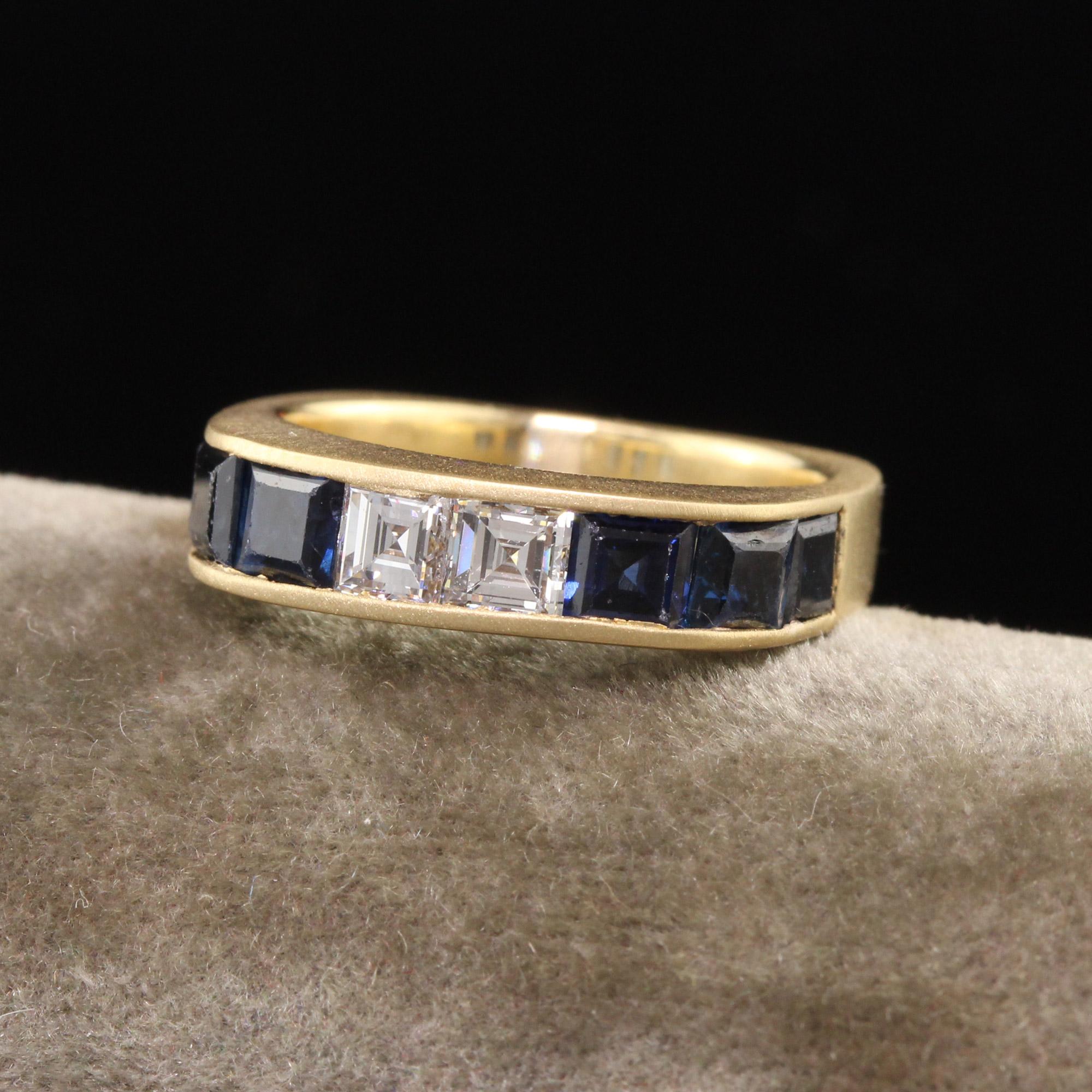 Beautiful Vintage Estate Retro18K Yellow Gold Carre Cut Diamond and Sapphire Band. This beautiful vintage ring has two white carre cut diamonds in the center with natural sapphires on the left and right of them set in 18k yellow gold.

Item