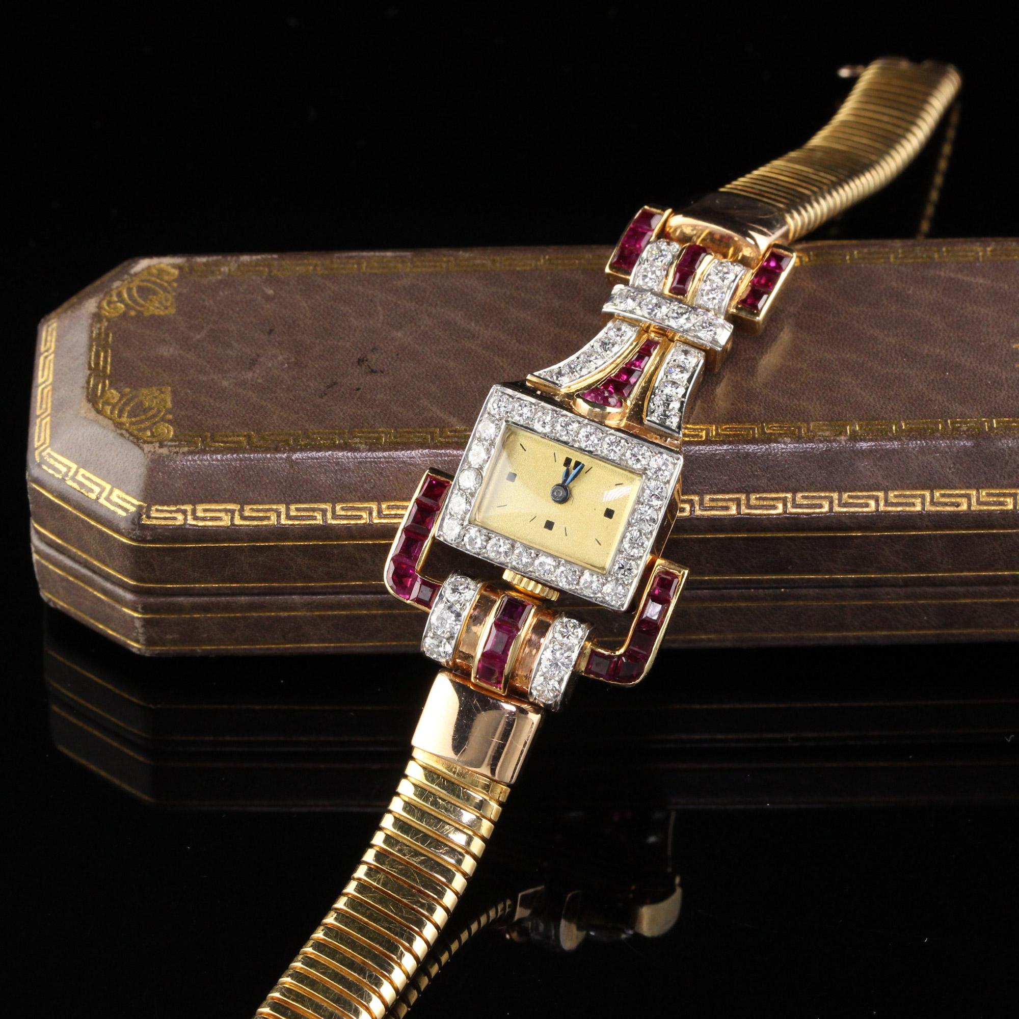 Vintage Retro yellow gold ladies wrist watch with diamonds and french cut rubies. In very good condition. 

Metal: 18K Yellow Gold

Weight: 43.7 Grams

Diamond Weight: Approximately 1.50 cts 

Diamond Color: G

Diamond Clarity: VS1

Measurements: 7