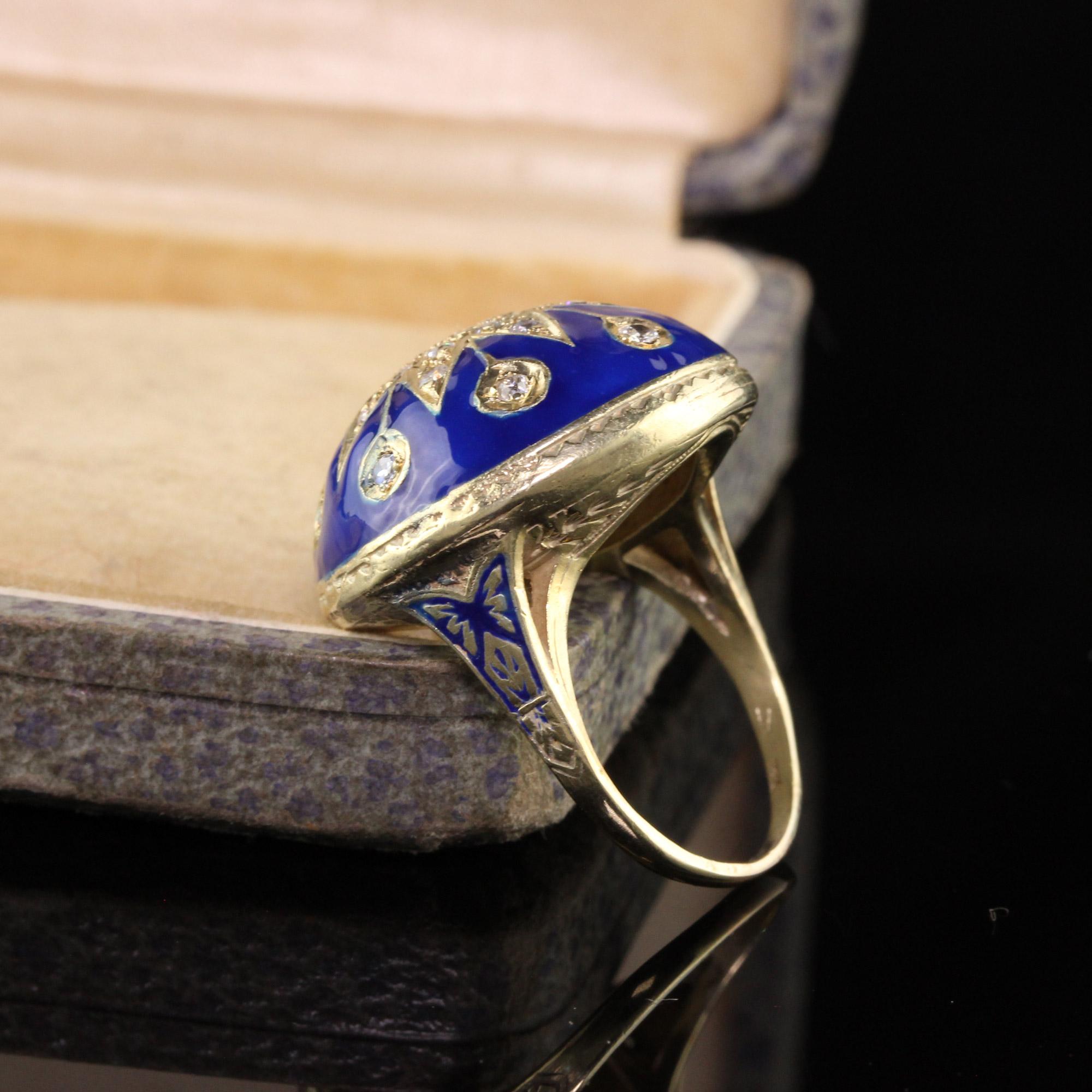 Beautiful Vintage Retro 18K Yellow Gold Enamel and Diamond Cocktail Ring. This unique ring features a flower pattern in the middle of deep blue enamel and has single cut diamonds on it.

Item #R0848

Metal: 18K Yellow Gold

Diamond: Approximately