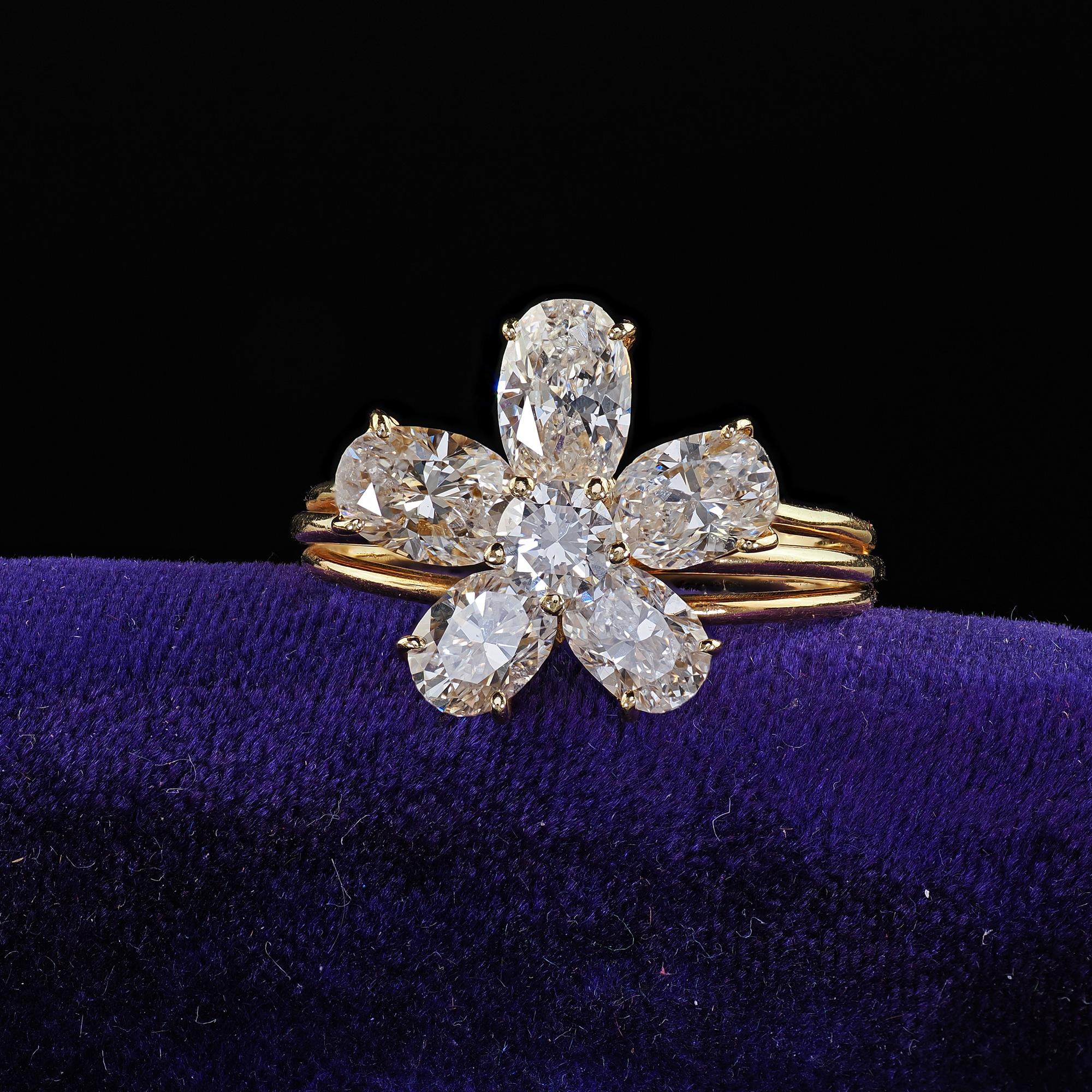Beautiful Vintage Retro 18K Yellow Gold Floral Oval Diamond Low Profile Cocktail Ring. This incredible Retro low profile diamond cocktail ring is crafted in 18k yellow gold. This ring features beautiful elongated oval diamonds set in a floral