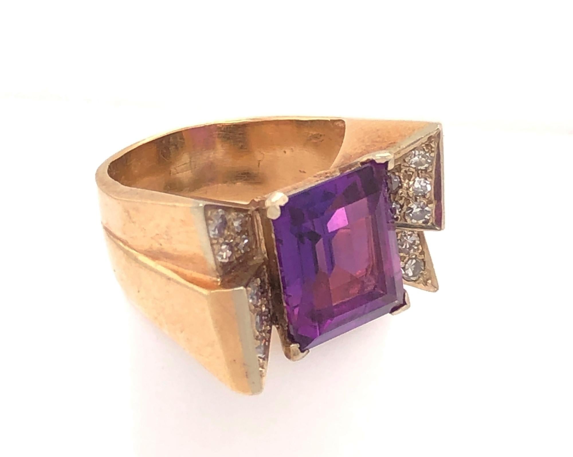 Vintage Retro Bow Design Amethyst Diamond 14K Yellow Gold Ring. This is a beautiful vintage retro bow design ring c.1940. The ring is set with a natural amethyst and 18 round diamonds. The amethyst has amazing color and clarity estimated weight 6