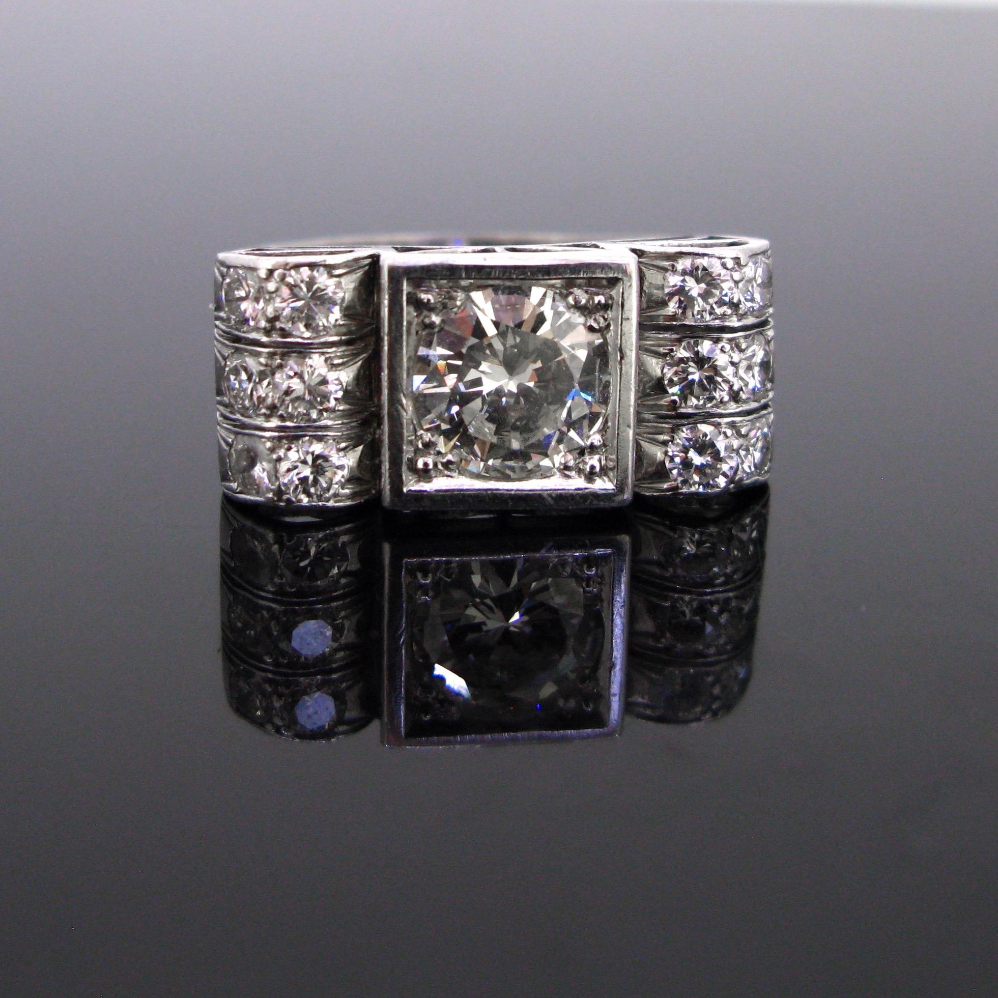 This ring comes directly from the Retro Era (circa 1940). These rings were mostly geometric, big and bold with a bombe or boule design. This one is a real testimony of the Retro period.  It is set with a vibrant brilliant cut diamond weighing